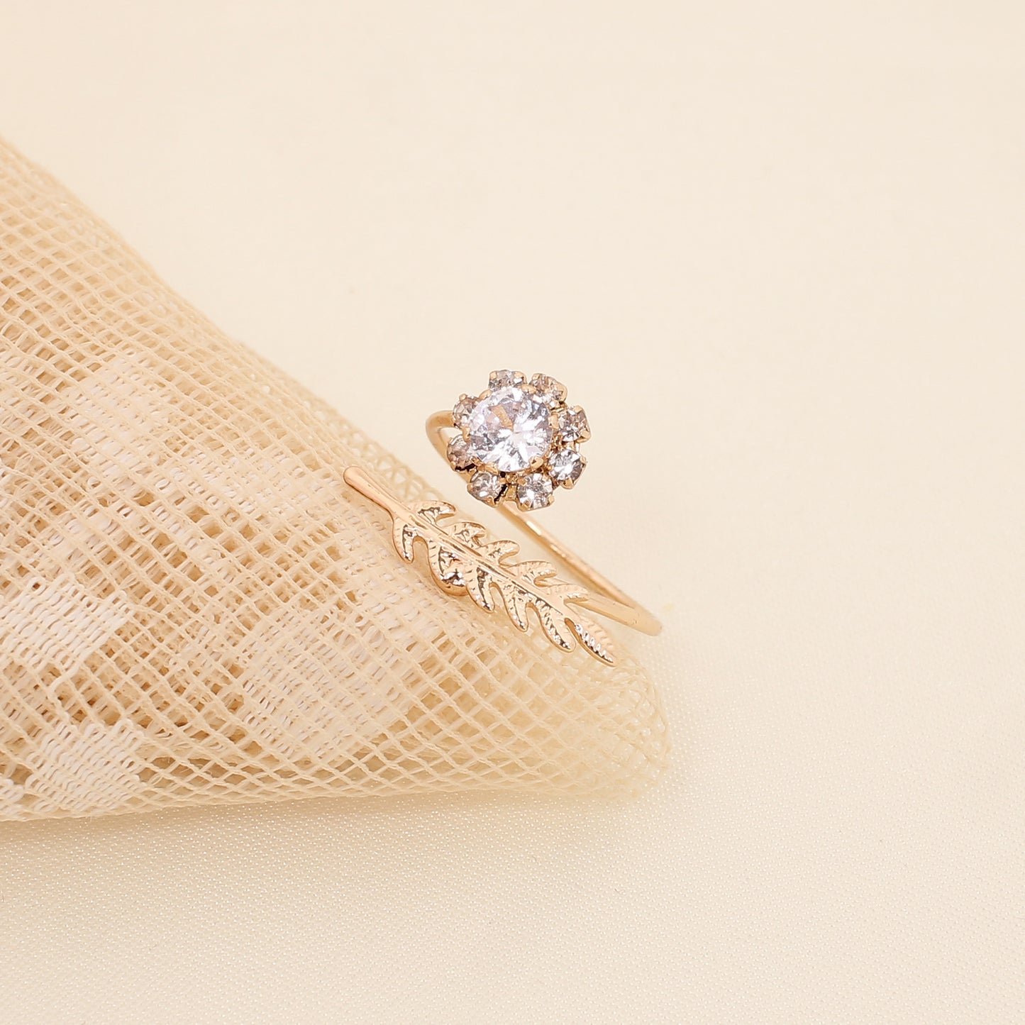 CKLAKART's Gold Polished Leaf and Flower ring with white American Diamond Accents