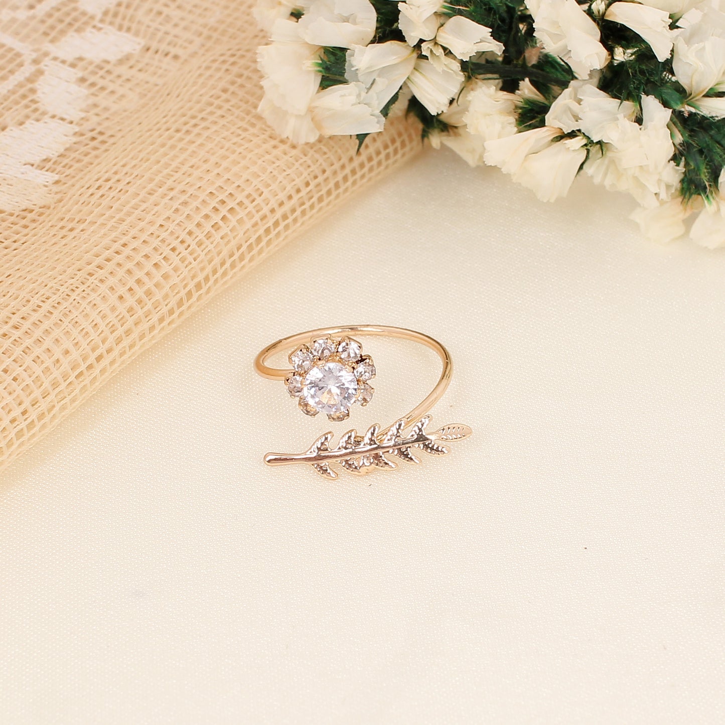 CKLAKART's Gold Polished Leaf and Flower ring with white American Diamond Accents