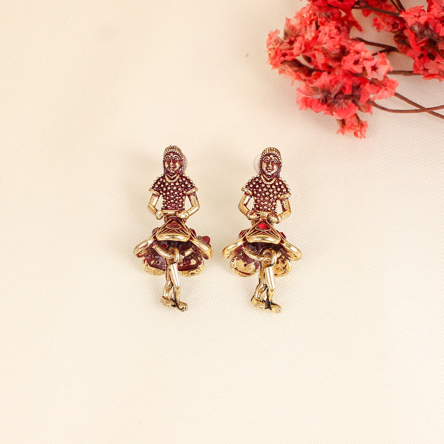 CKLAKART's Antique Gold toned Earrings with Ruby-Studded Dancing Figures