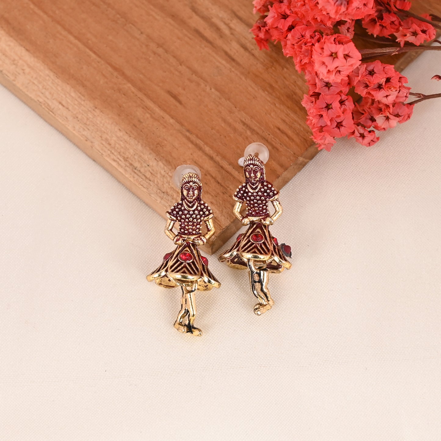 CKLAKART's Antique Gold toned Earrings with Ruby-Studded Dancing Figures