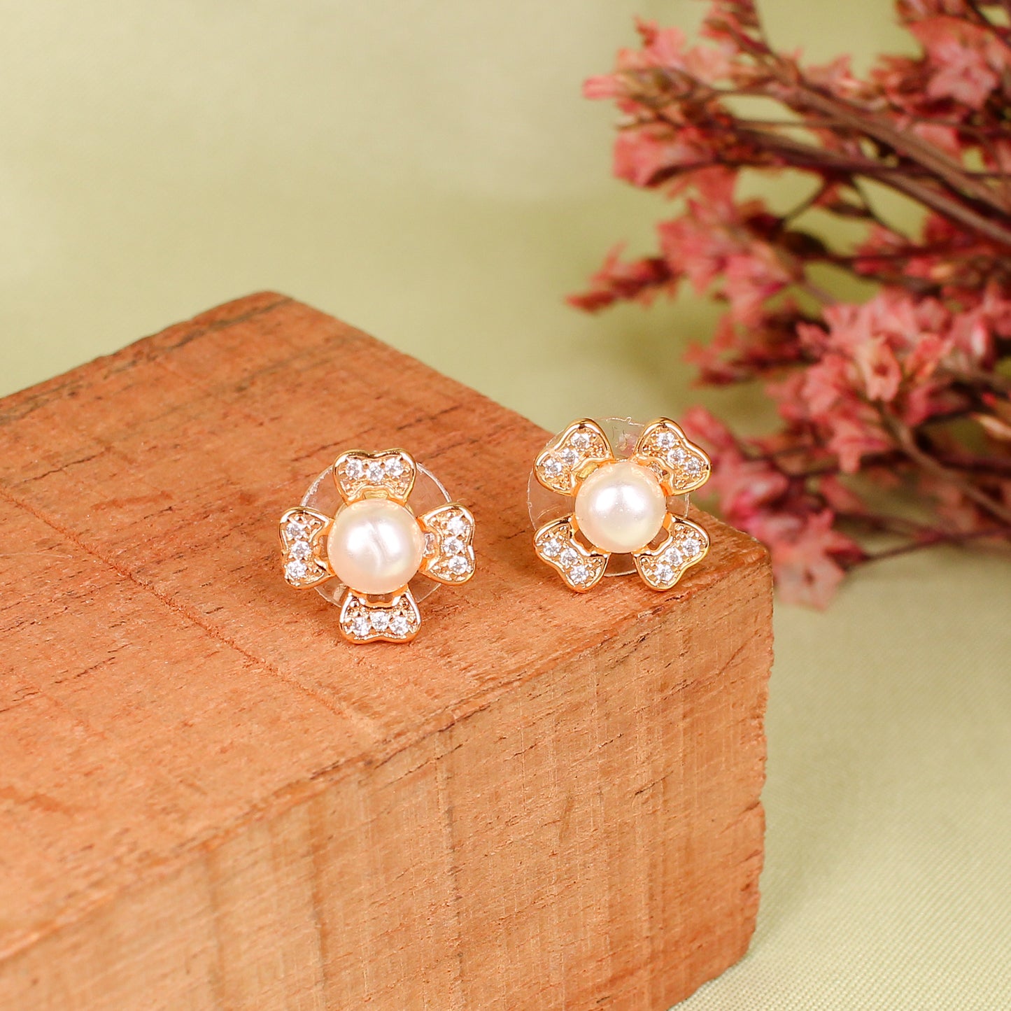 CKLAKART's Rose Gold Flower-Shaped Studs with Center Pearl