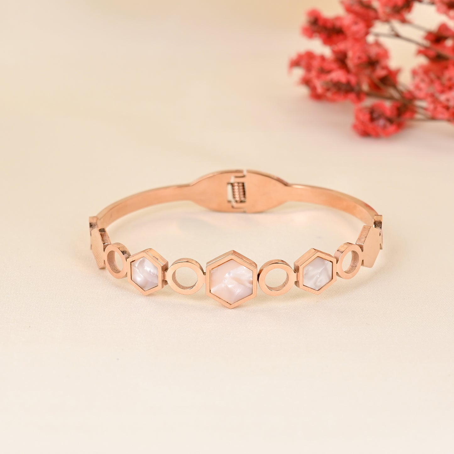 CKLAKART's Rose Gold Geometric Bracelet with White Stone Accents