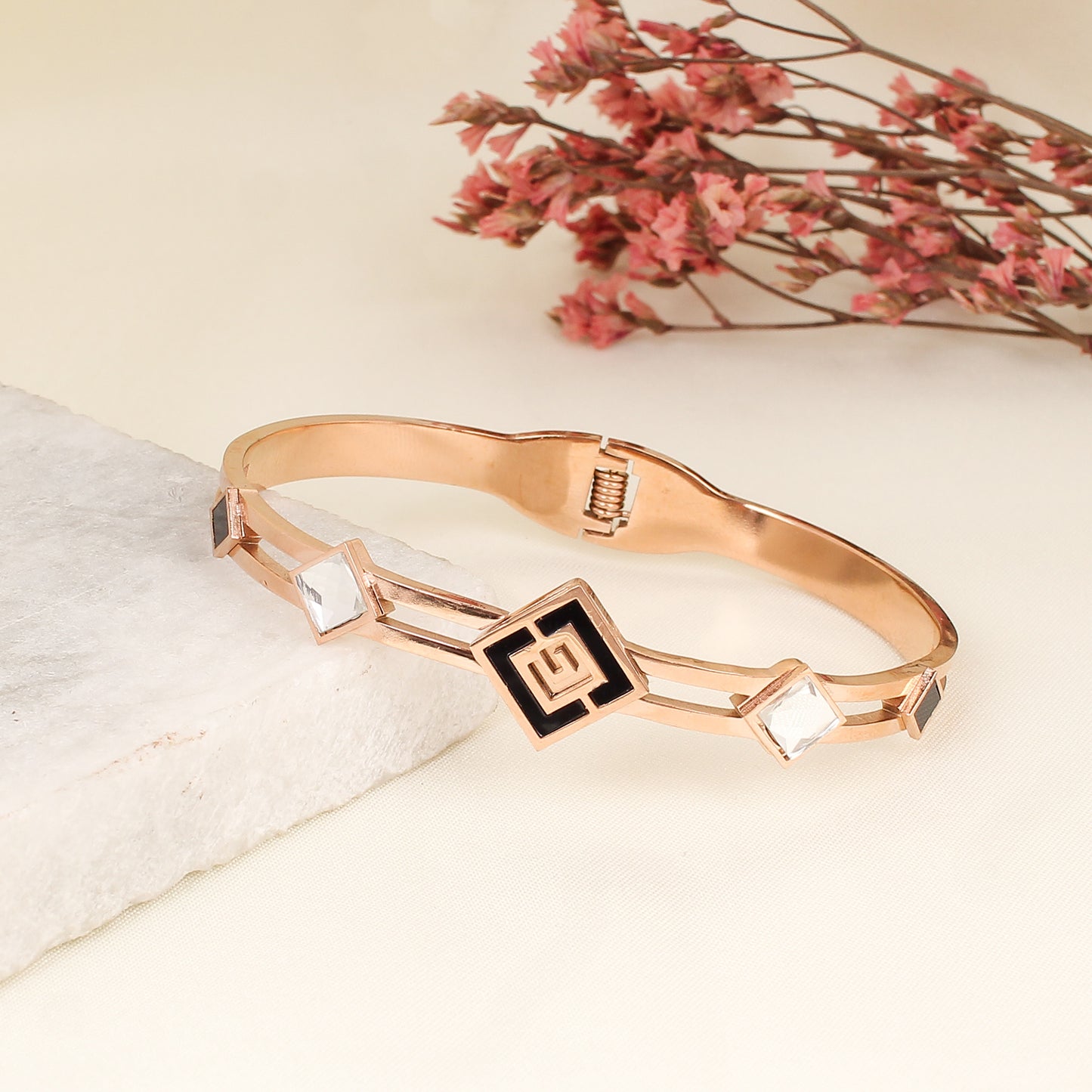 CKLAKART's Rose Gold Geometric Bracelet with White Stone Accents