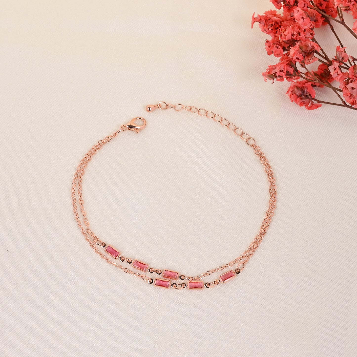 CKLAKART's Twin Chain Bracelet with Pink Stone Embellishments