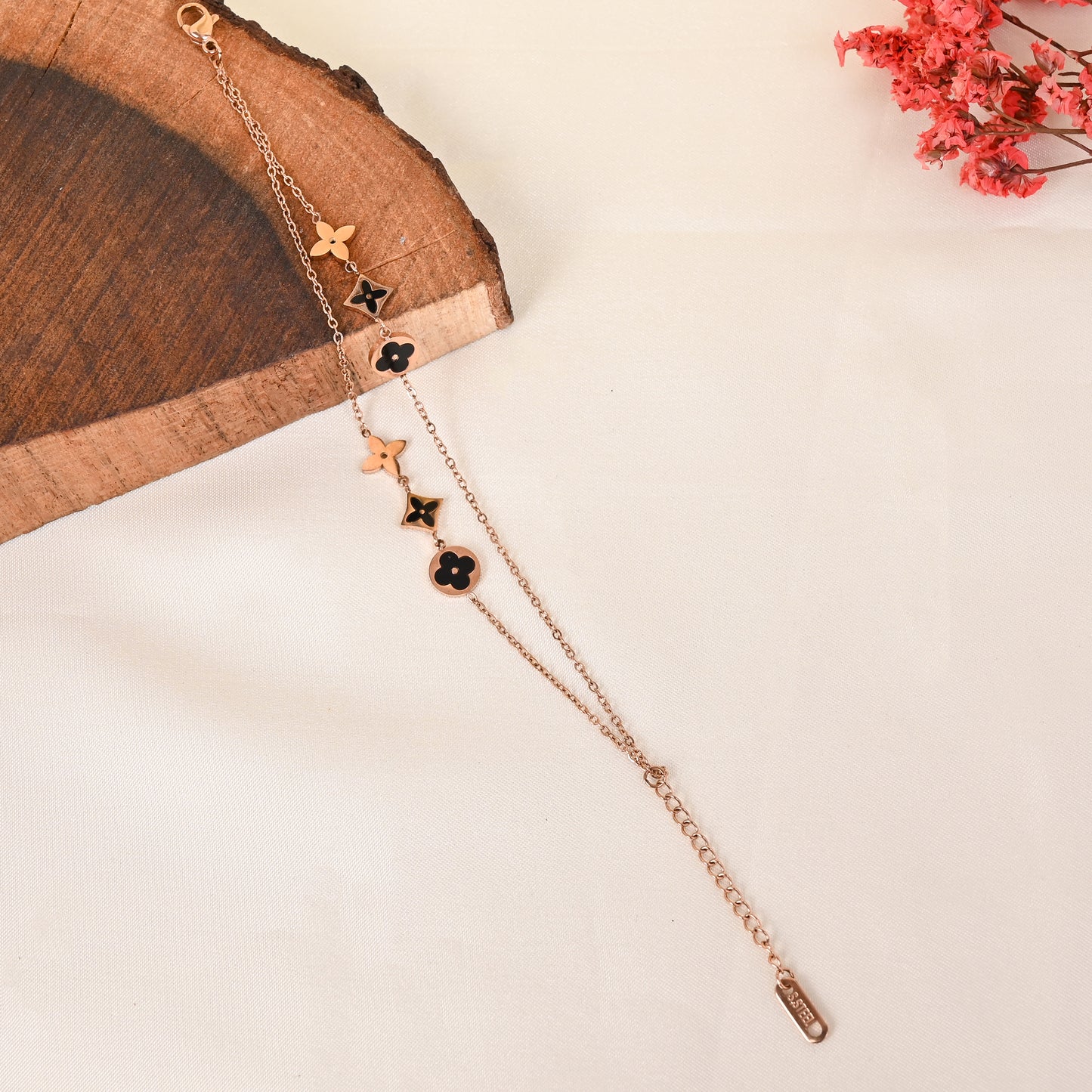 CKLAKART's Multi-Flower Rose Gold Bracelet with Twin Chains for Added Glamour
