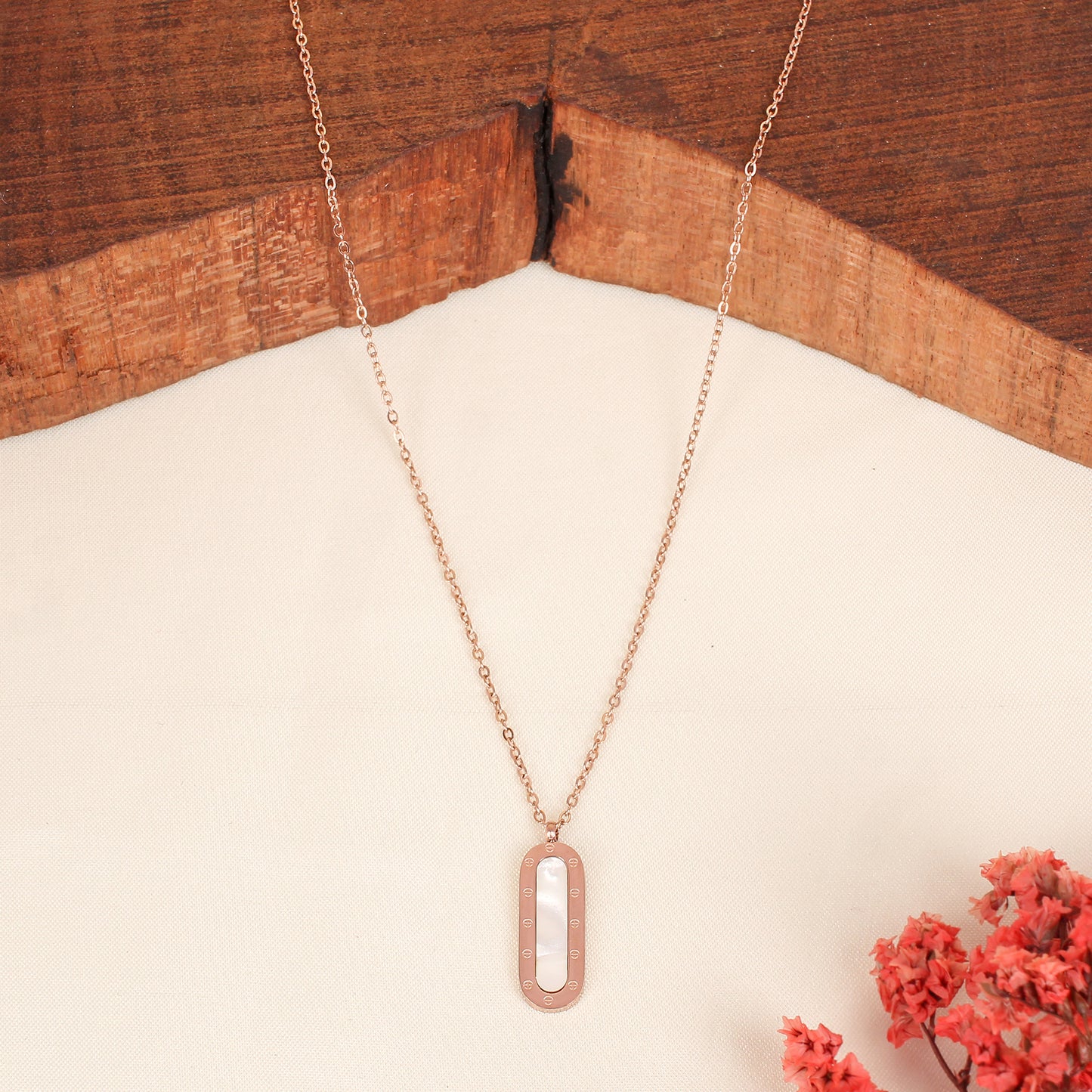 CKLAKART's Rose Gold Toned Necklace with Stunning Oval Pendant