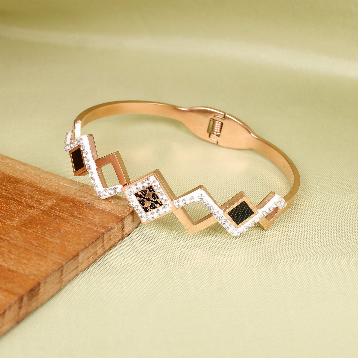 CKLAKART's Rose Gold Geometric Bracelet with White Stone Detailing
