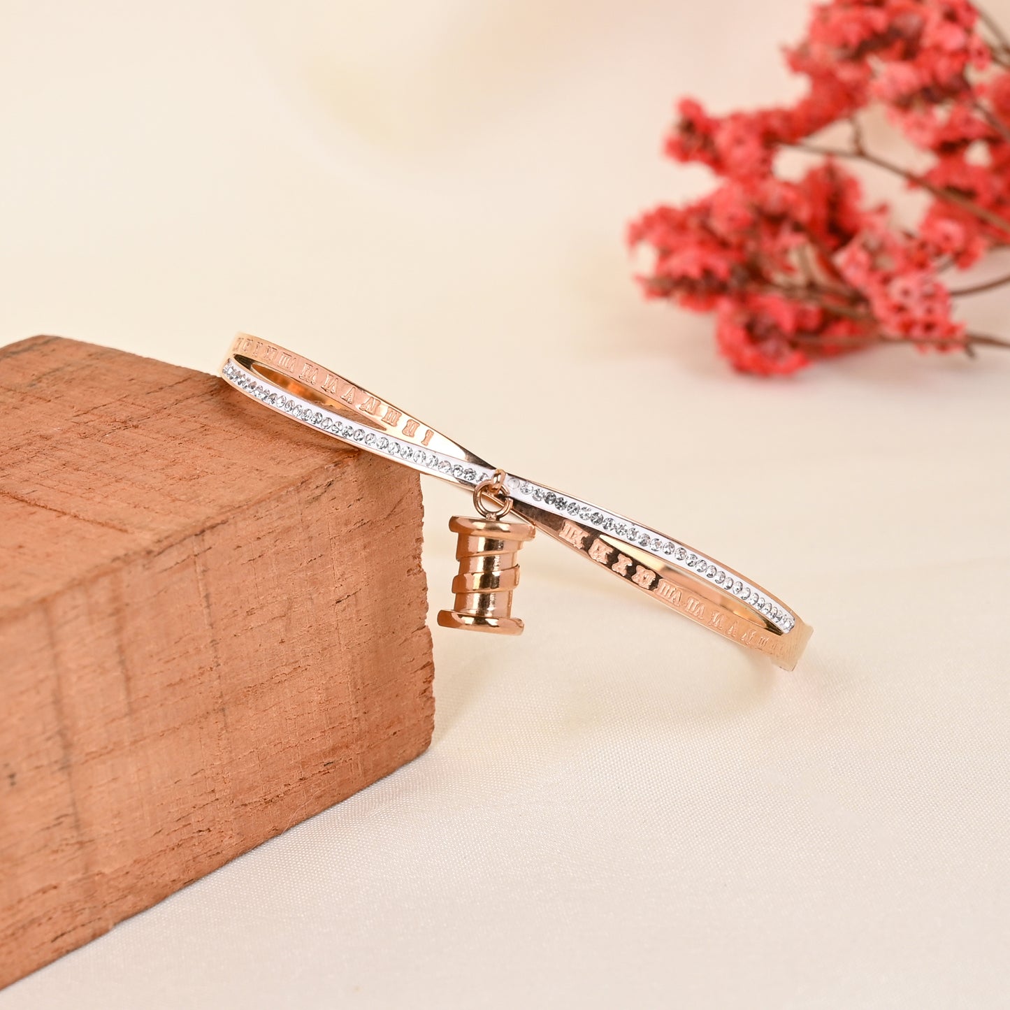 CKLAKART's Rose Gold Bracelet with Stone-Adorned Lustrous Drops