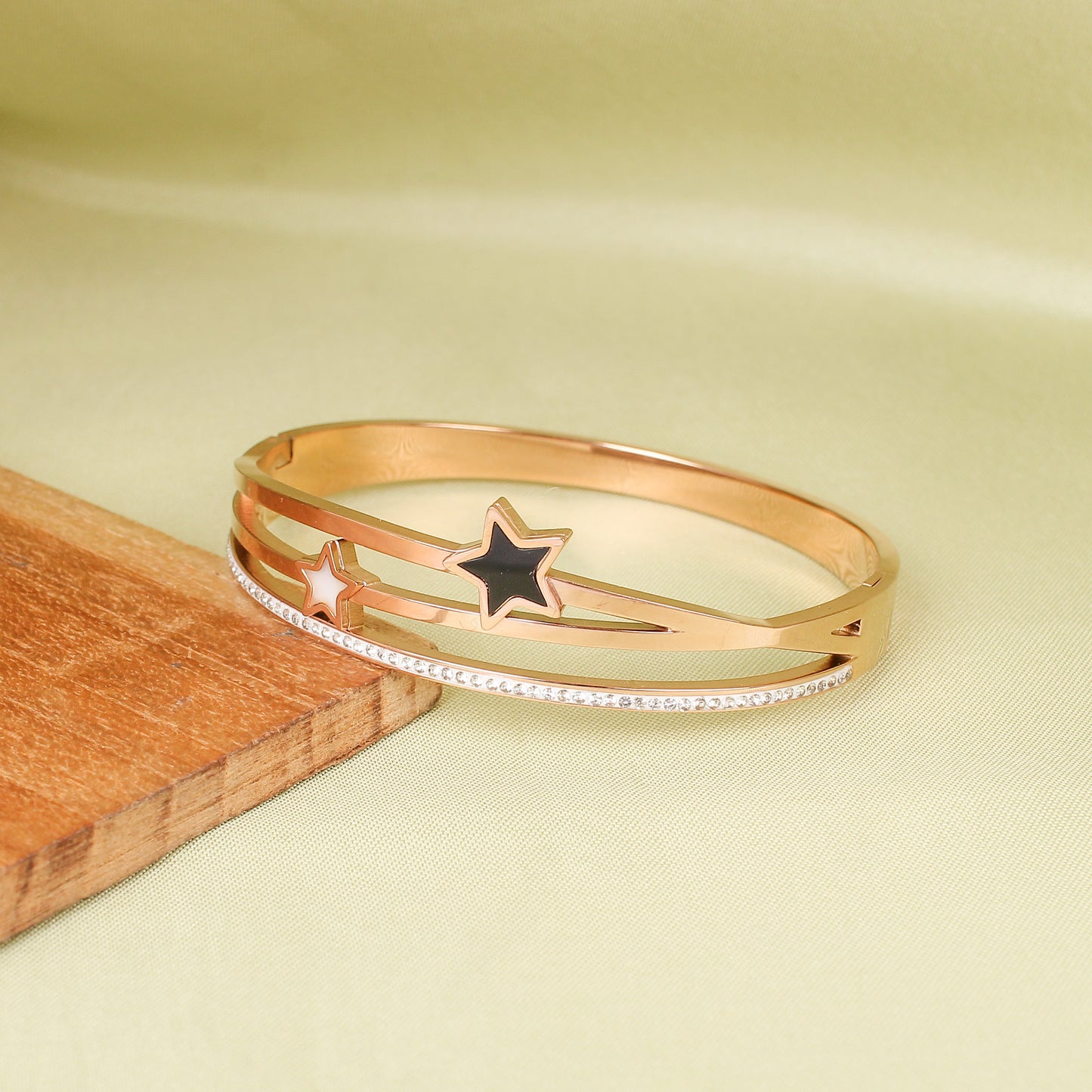 CKLAKART's Star-Shaped Bracelet with Black and White Stones in Multi-Line Pattern