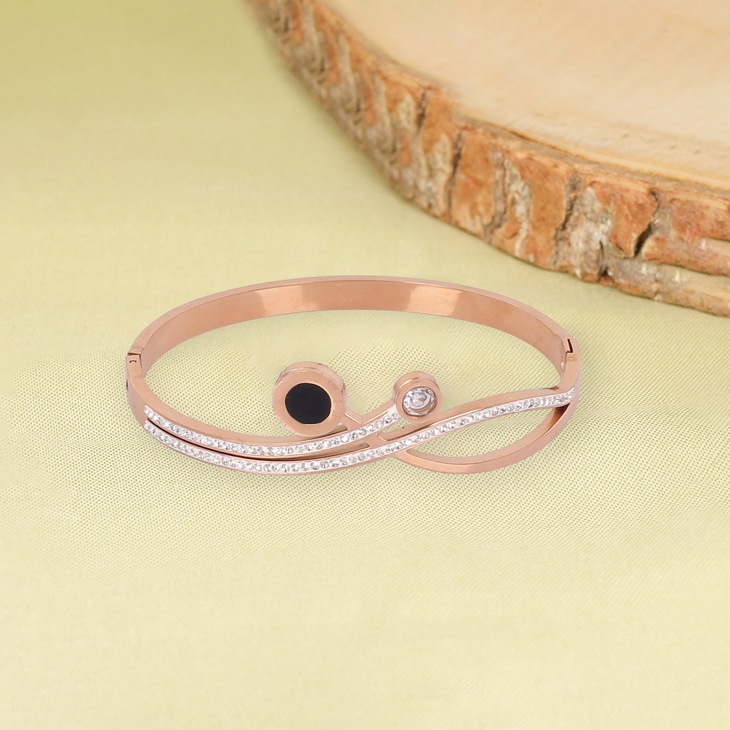CKLAKART's Rose Gold-Toned Bracelet with Cascading White Stones