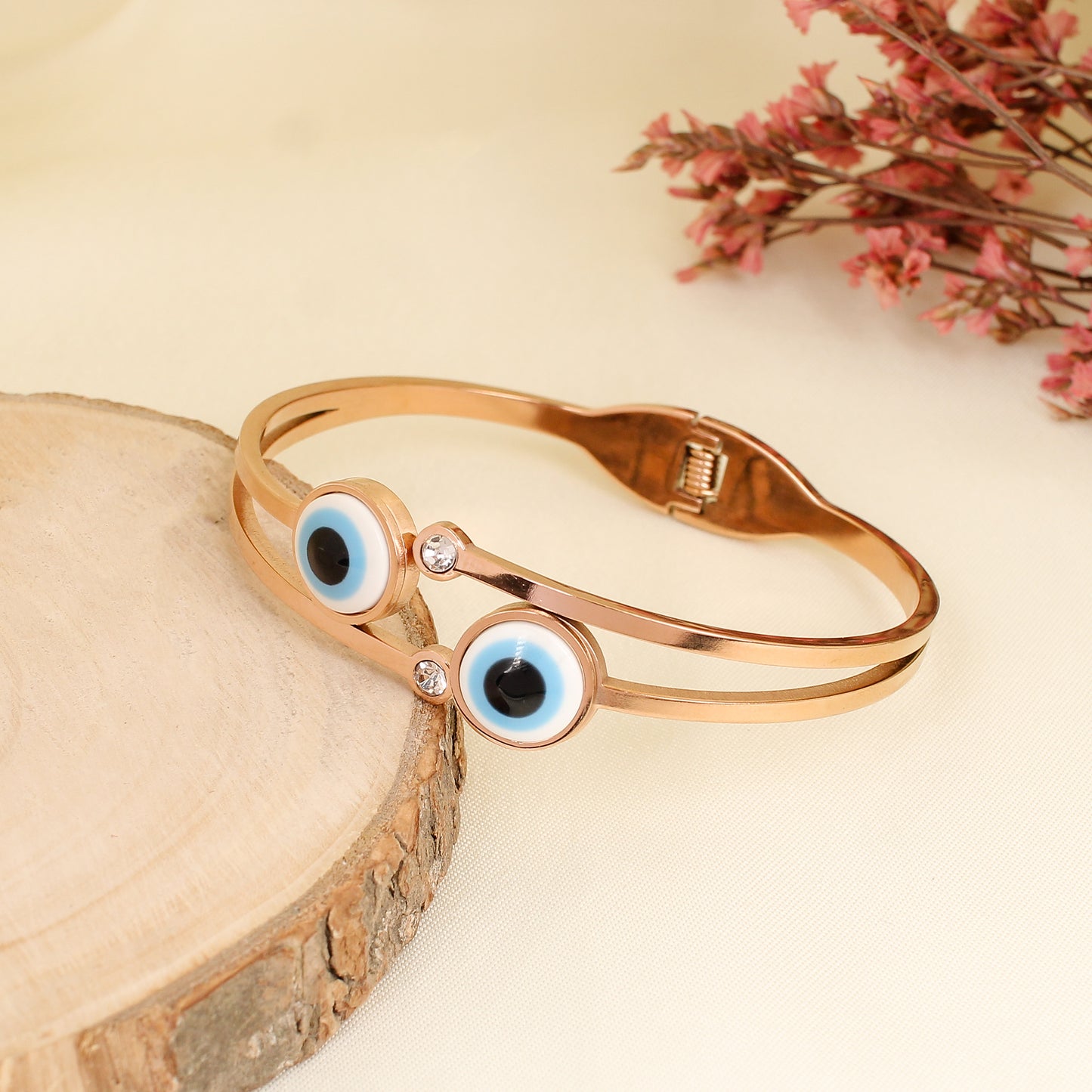 CKLAKART's Rose Gold Bracelet featuring Twin Evil Eye Charms