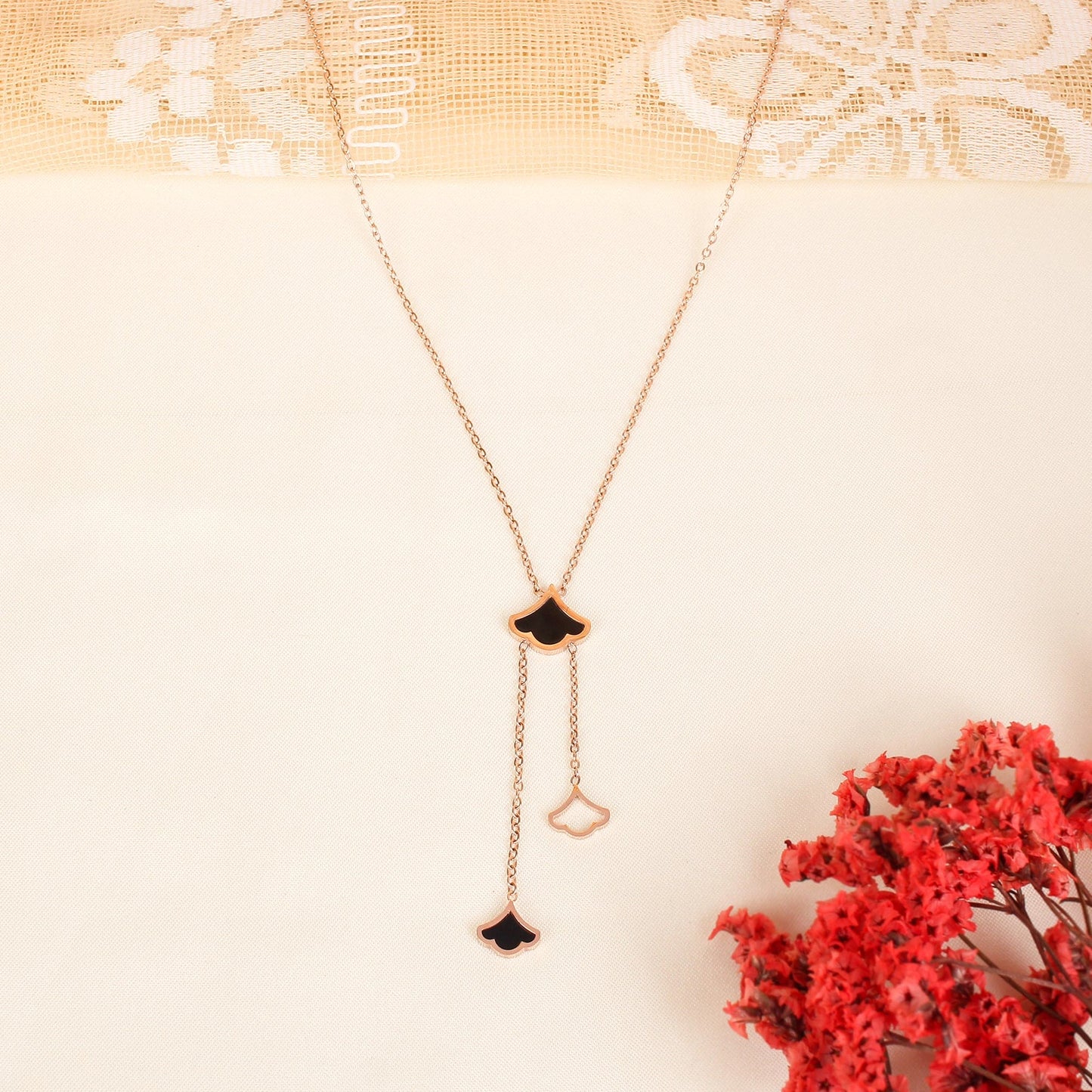 CKLAKART's Rose Gold Toned Necklace with Delicate Petal Droplets