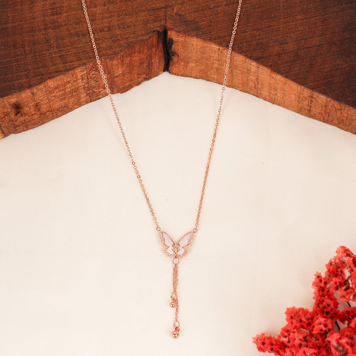 CKLAKART's Delicate Rose Gold Toned Chain Neckpiece with Butterfly and Bead Droplets