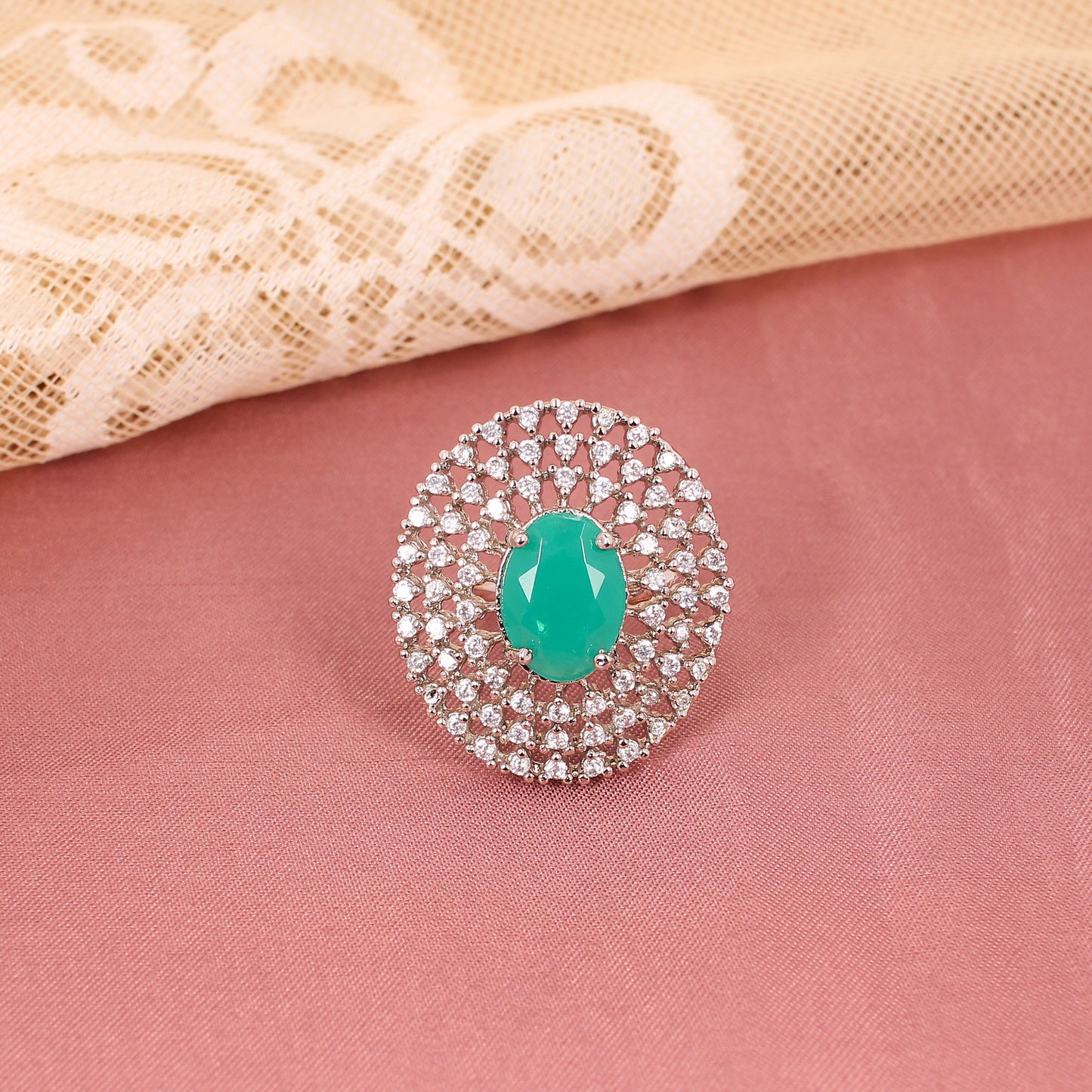 CKLAKART's Silver-Toned Statement Ring with Oval Emerald Green and Layers of White Stones