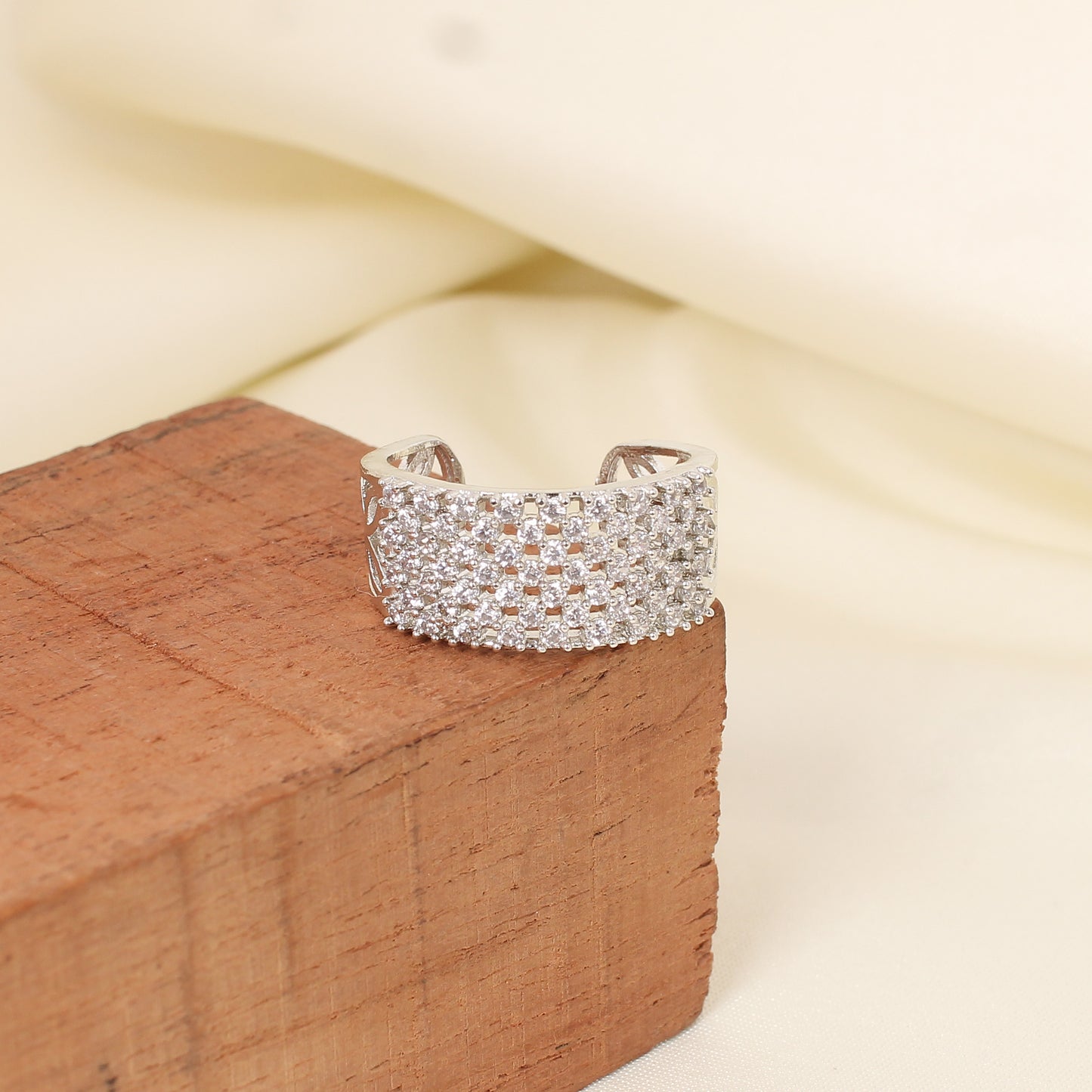CKLAKART's Silver-Toned Band Ring Adorned with Shimmering White Stones