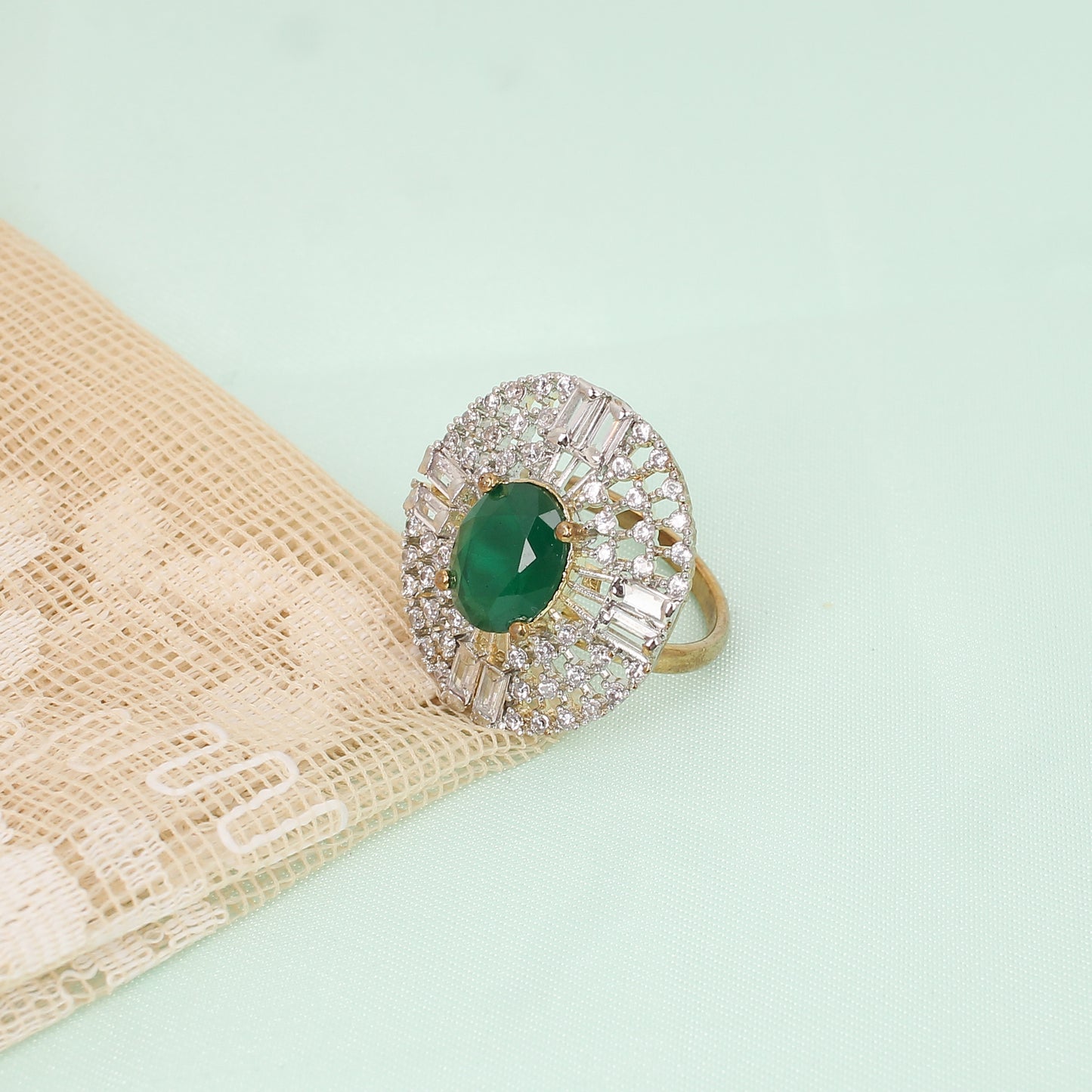 CKLAKART's Silver-Toned Big Ring with Oval Emerald Green and Surrounding White Stones