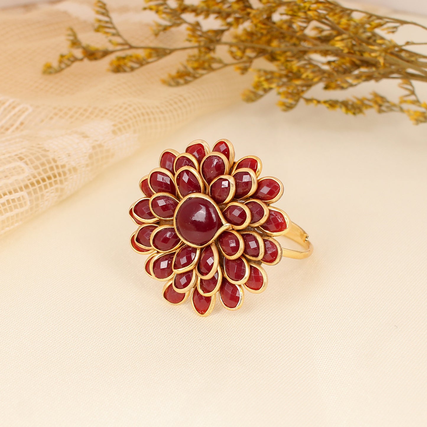 CKLAKART's Big Flower Ring with Gold-Toned Setting and Striking Maroon Stones