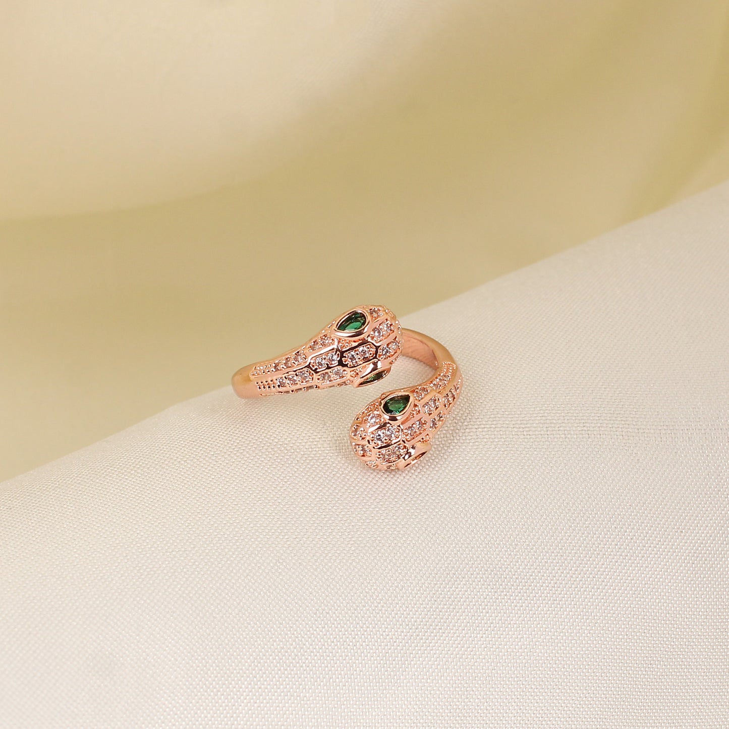 CKLAKART's Serpent's Charm Adjustable Rose Gold Ring with Green Stones and Zirconia