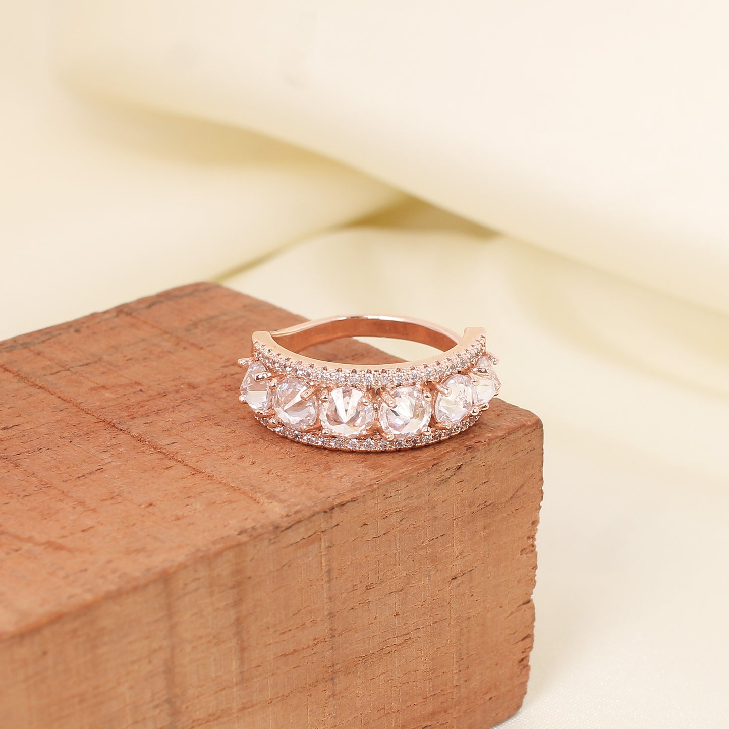 CKLAKART's Glowing Harmony Rose Gold Ring with Band-Shaped White Stones