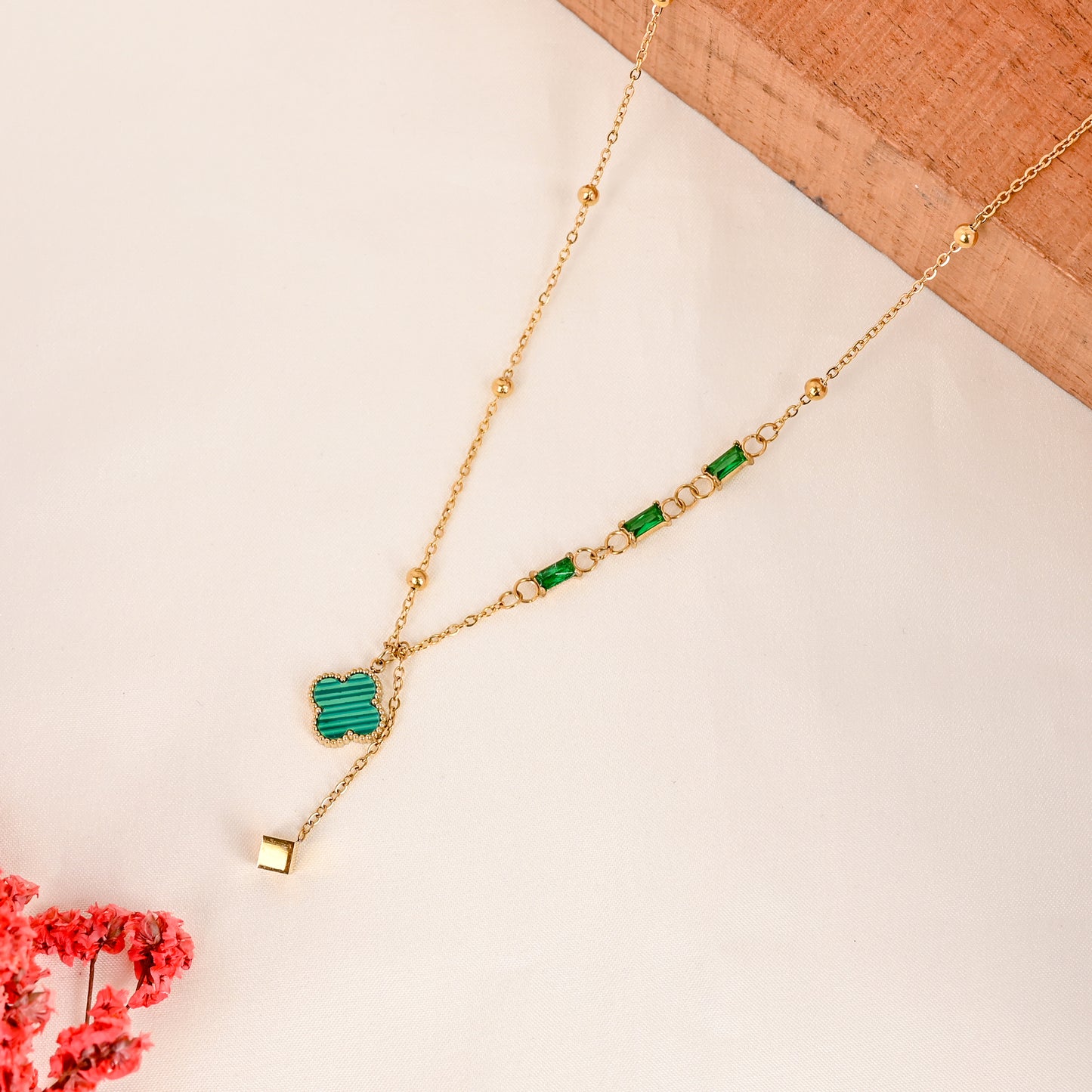CKLAKART's Gold Toned Beaded Chain Neckpiece with Geometric Patterns With Green Stones