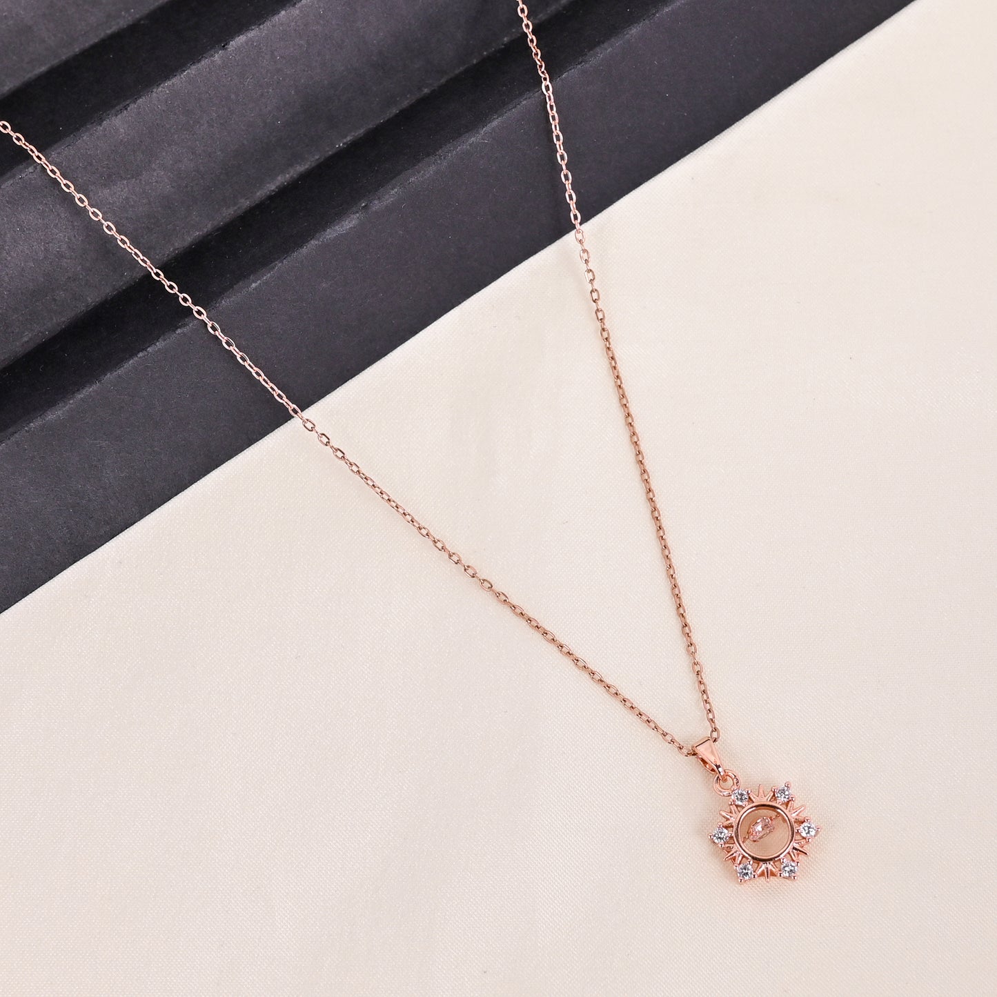 CKLAKART's Rose Gold Tone Sun Pendant Necklace with Dazzling Stones