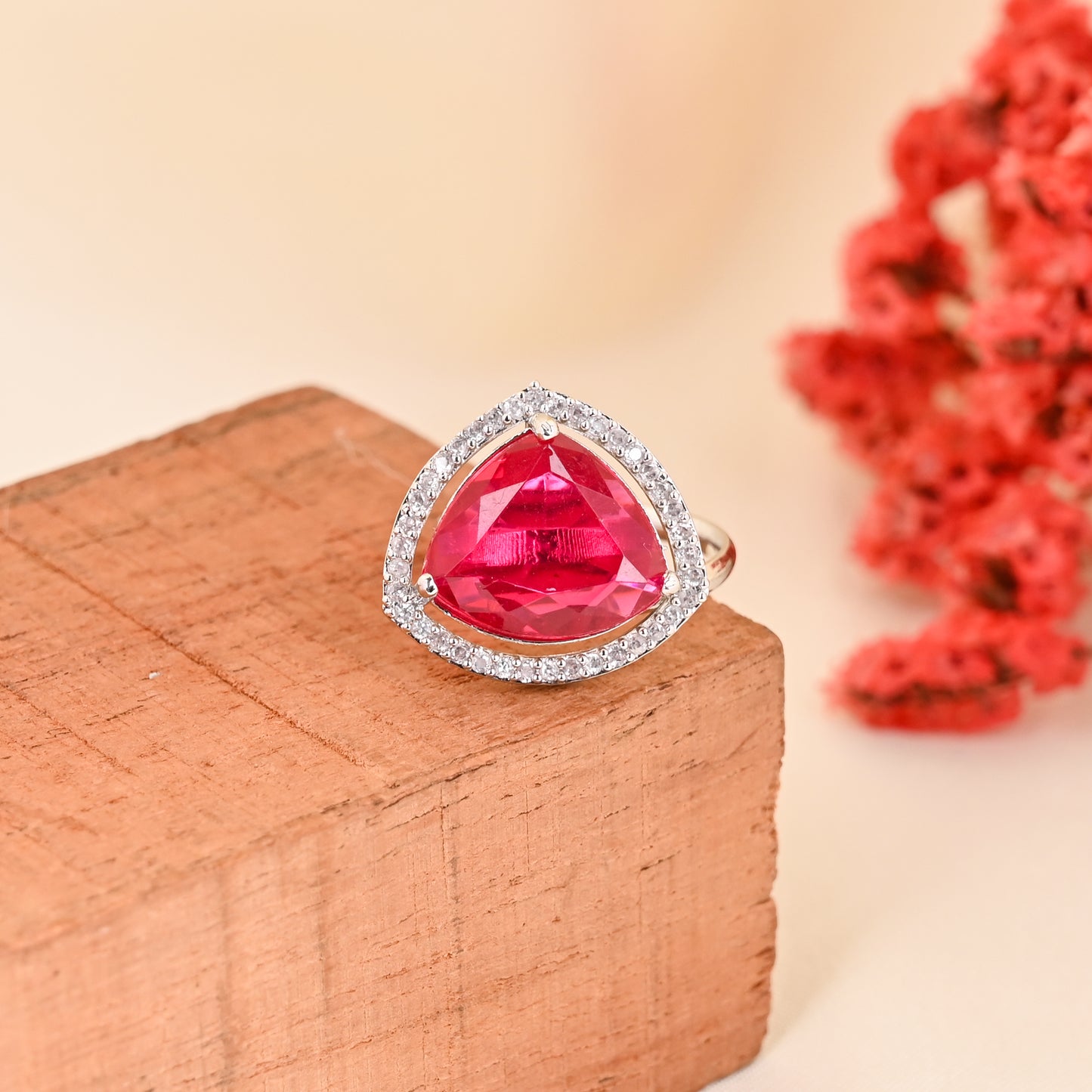 CKLAKART's NOOR Silver-Toned Ring Adorned with Triangle-Shaped Ruby color Stone and American Diamonds