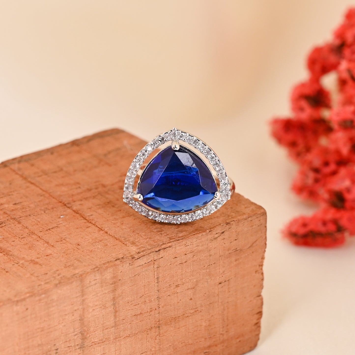 CKLAKART's NOOR Silver-Toned Ring Adorned with Triangle-Shaped Blue Sapphire color Stone and American Diamonds