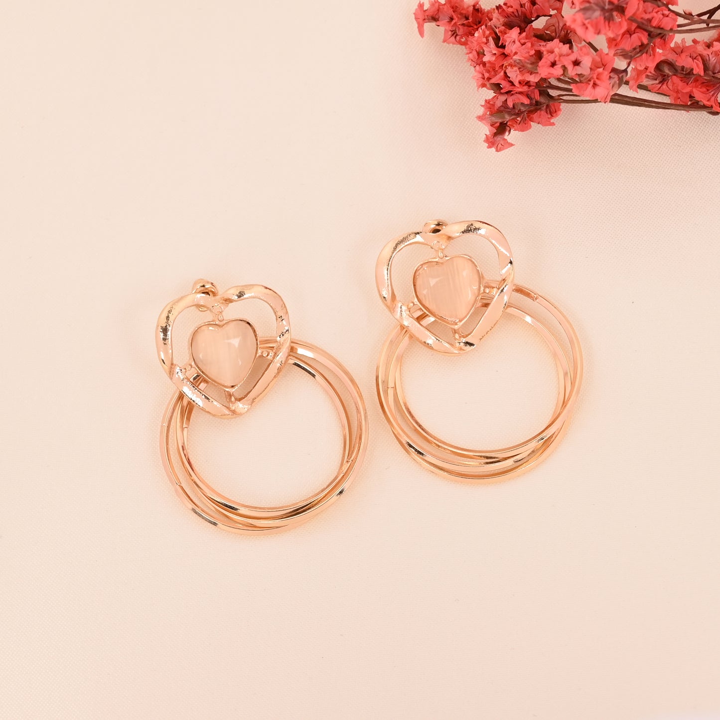 CKLAKART's Gold Toned Heart Shaped Dangle Earrings