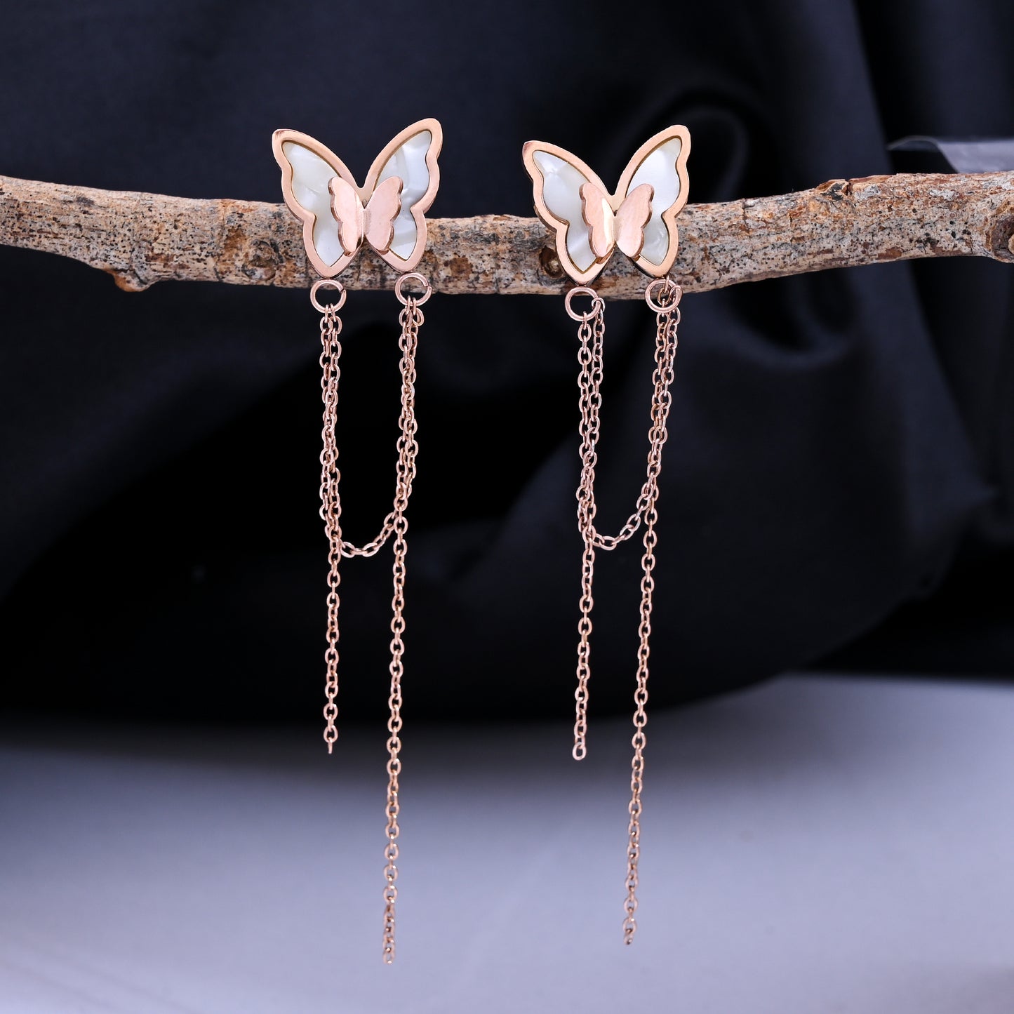 CKLAKART's Rose Gold Toned Butterfly Chain Drop Earrings
