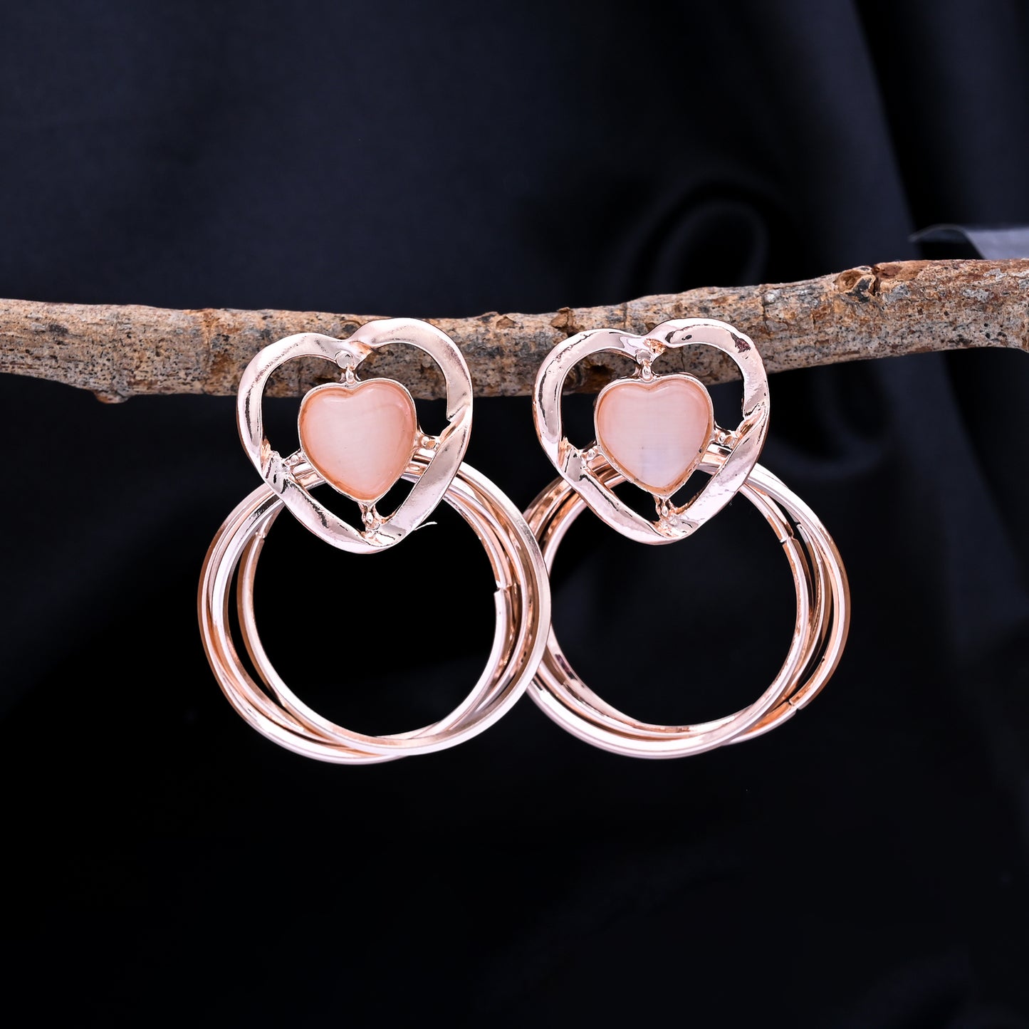 CKLAKART's Rose Gold Toned Heart Shaped Danglers
