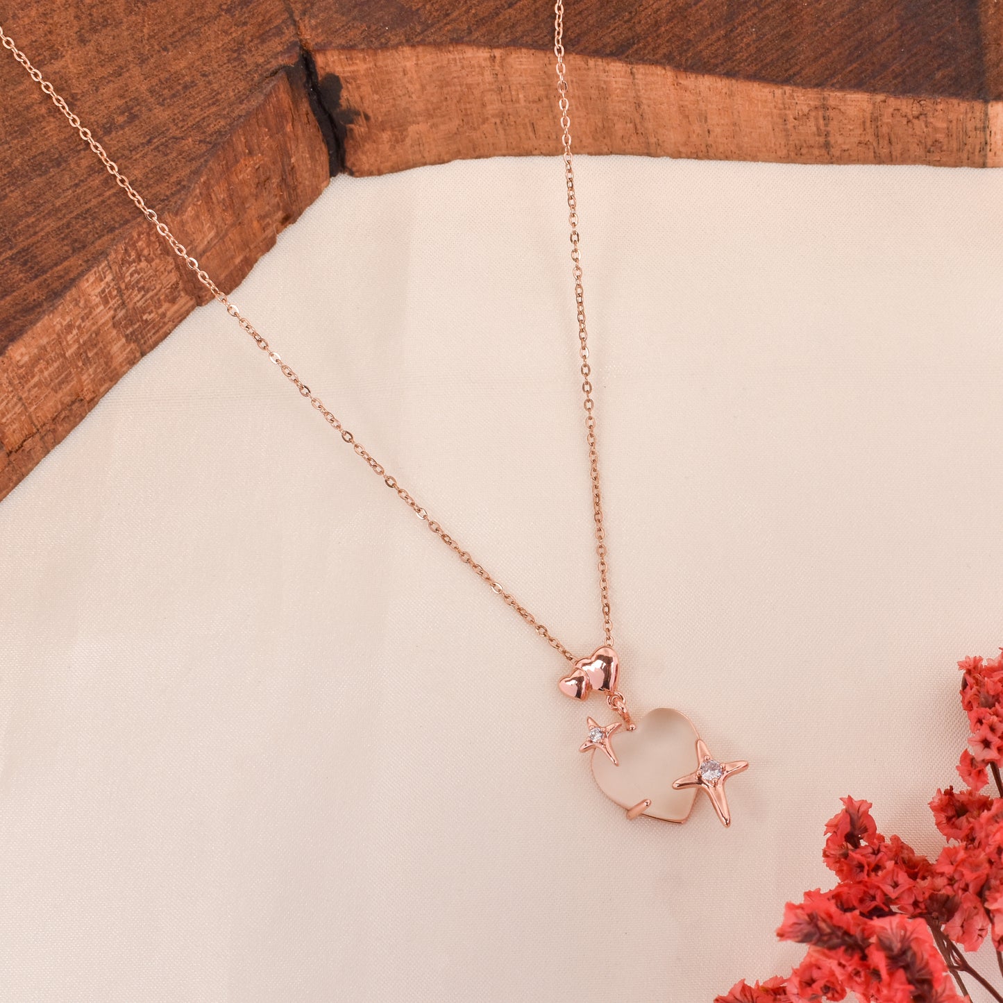 CKLAKART's Rose Gold Toned Sparkling Heart with Stars Pendant with Chain