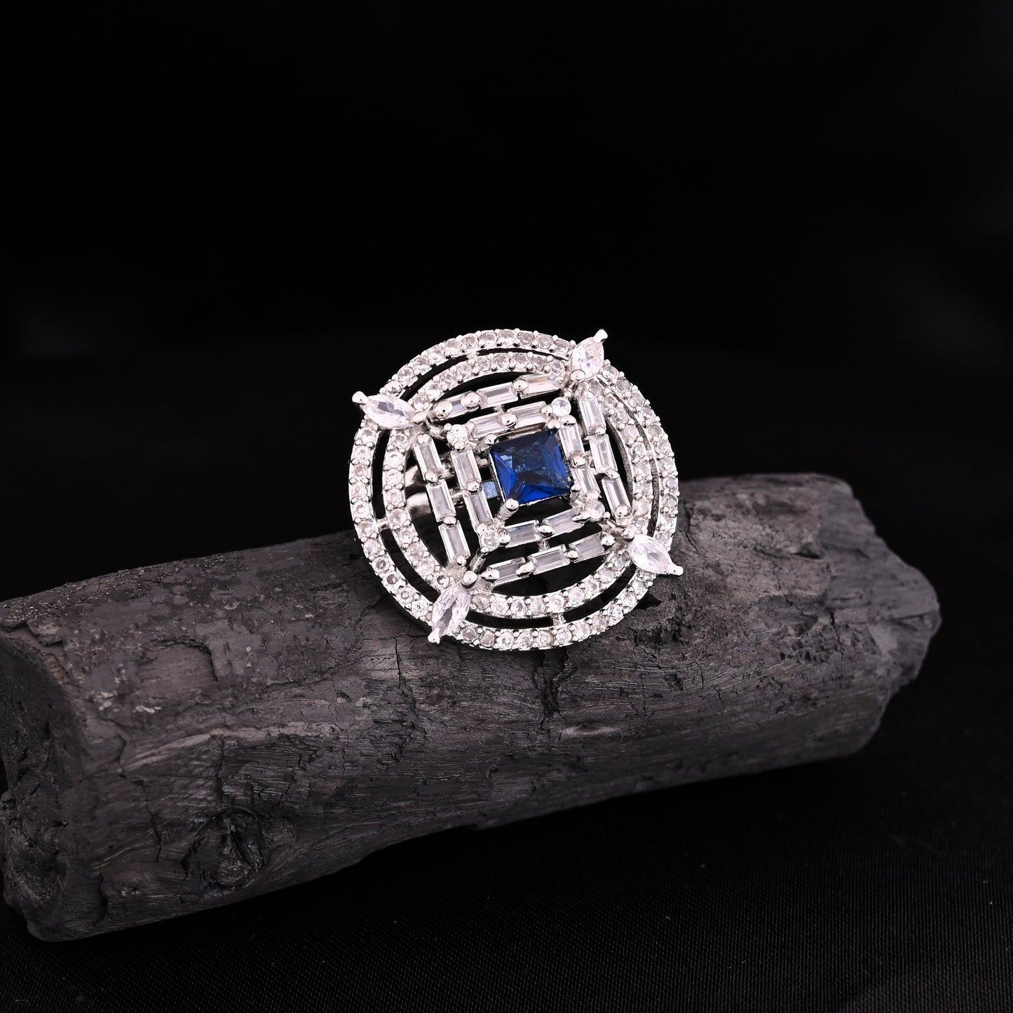 CKLAKART's NOOR Silver-Toned Ring Adorned with Blue Sapphire Stone and Sparkling American Diamonds