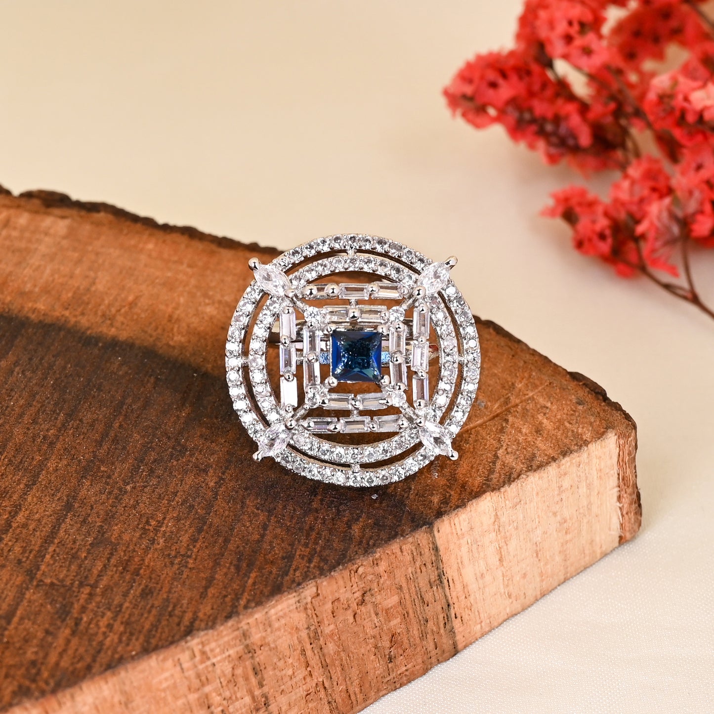 CKLAKART's NOOR Silver-Toned Ring Adorned with Blue Sapphire Stone and Sparkling American Diamonds