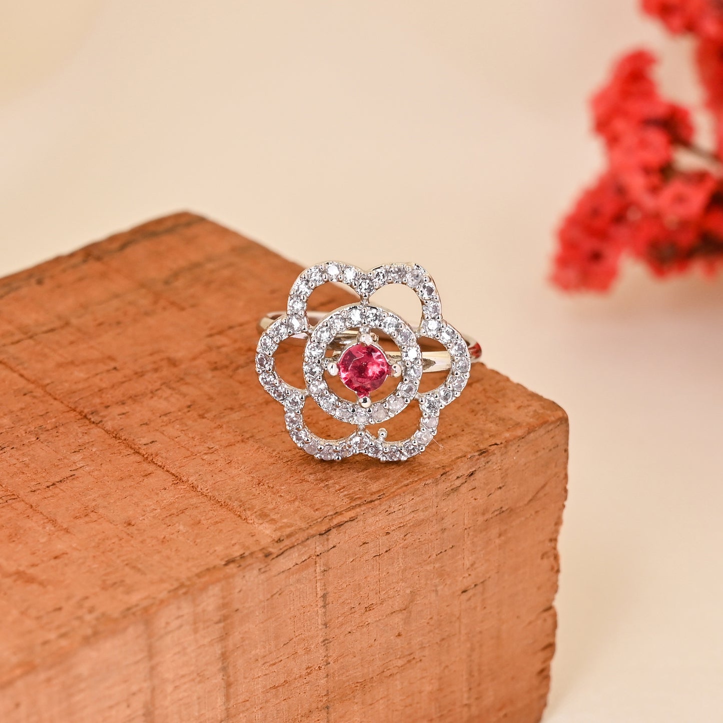 CKLAKART's NOOR Refined Silver-Toned Blooming Flower Ring Adorned with Ruby Color Stone and American Diamonds