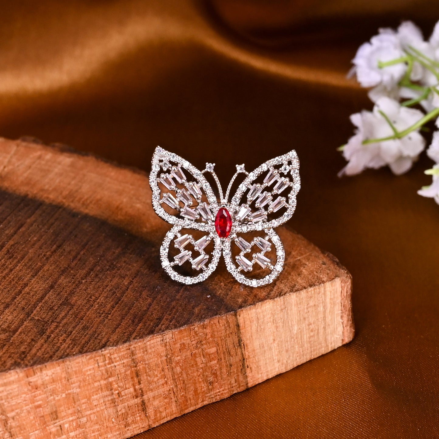 CKLAKART's NOOR Silver-Toned Butterfly Ring Adorned with Ruby Color Stone and Dazzling American Diamonds