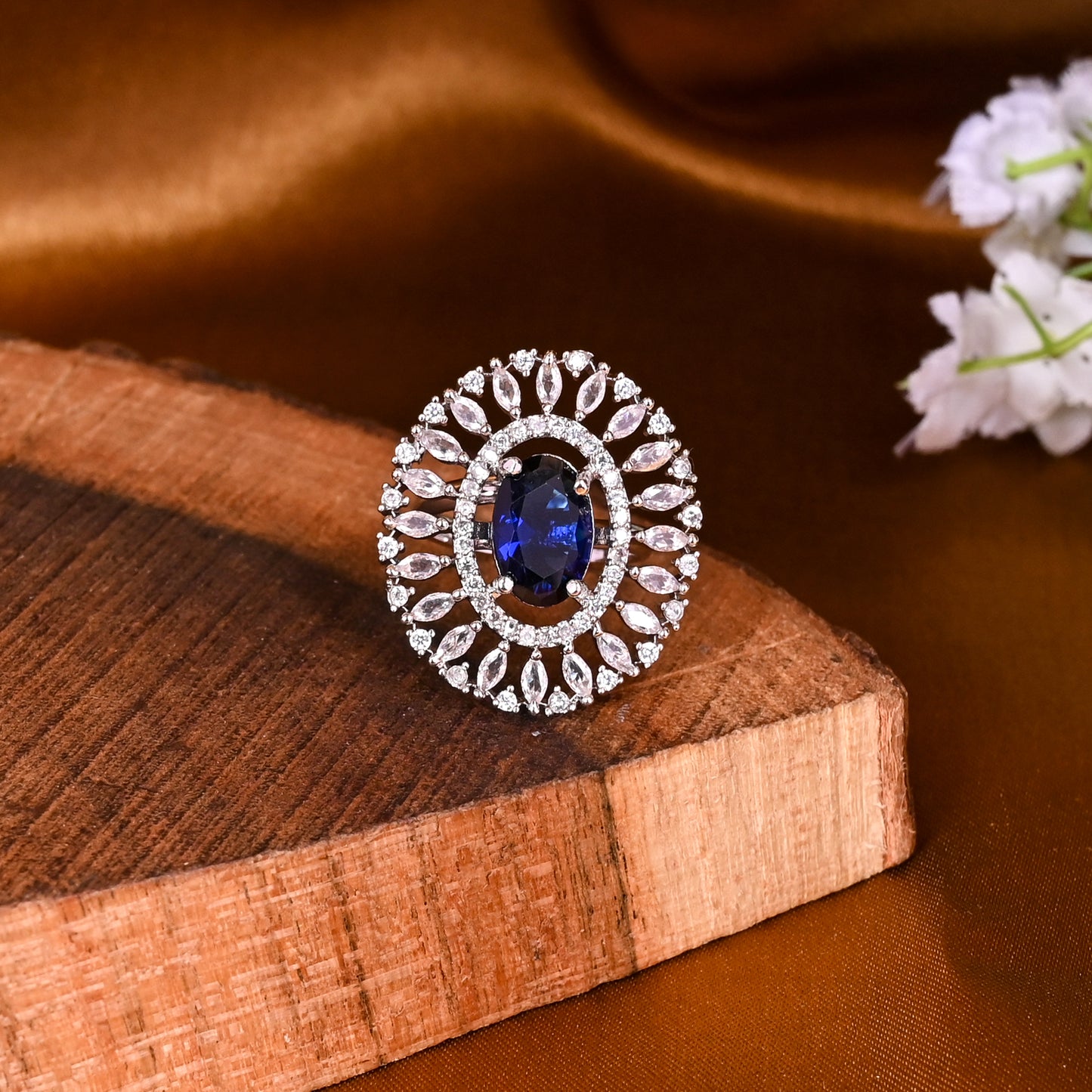 CKLAKART's NOOR Classic Silver-Toned Oval Ring with Blue Sapphire Color Stone and Sophisticated American Diamonds