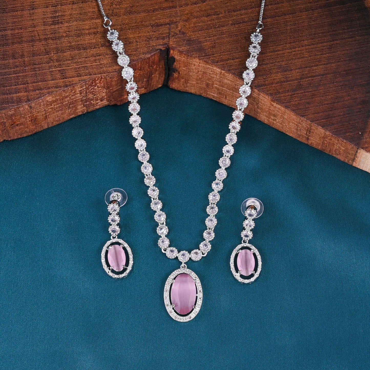 CKLAKART's NOOR Silver-Toned Oval Drop Necklace Set Adorned with Pink Stones and Dazzling American Diamonds