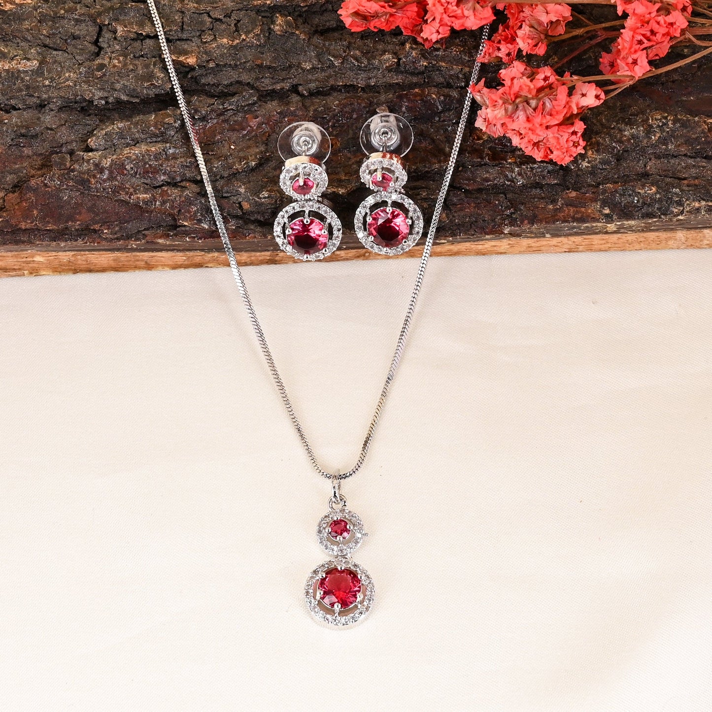 CKLAKART's NOOR Refined Silver Chain Pendant Set with Ruby Red Stones and Elegant American Diamond Accents