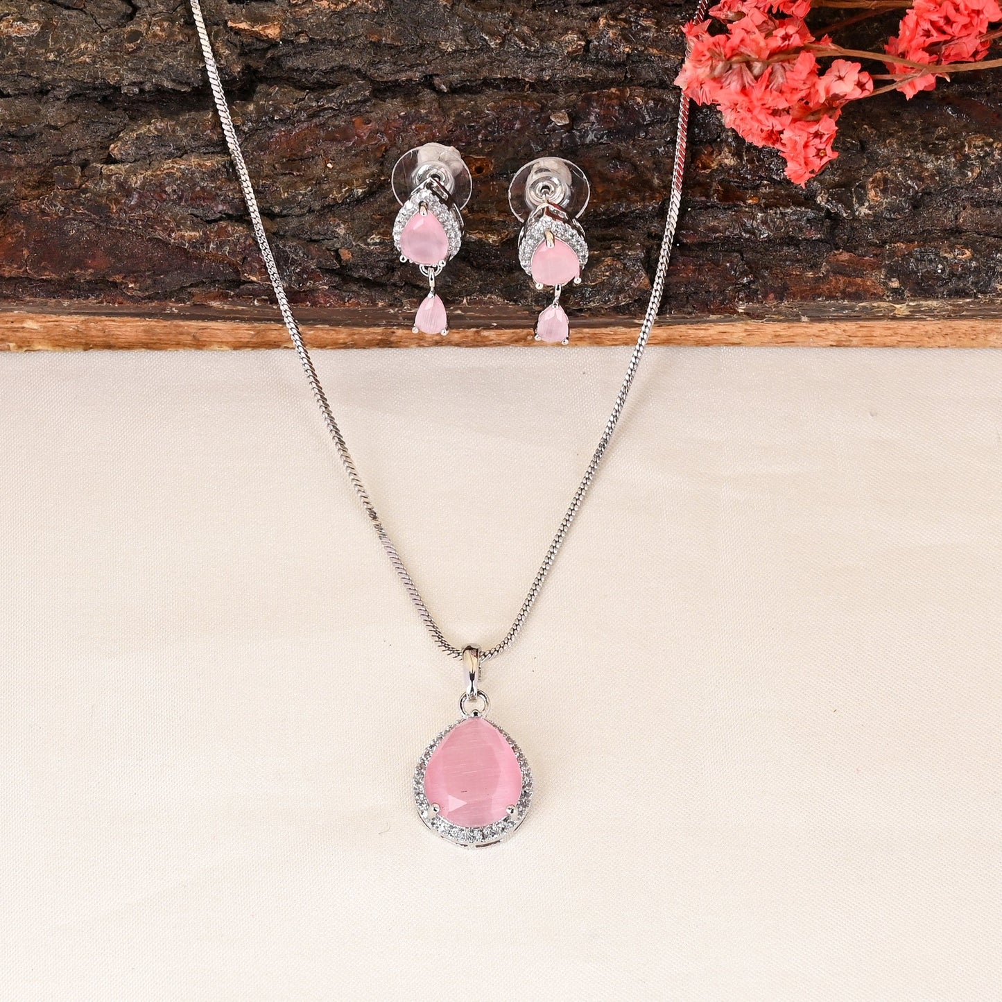 CKLAKART's NOOR Silver-Toned Chain Pendant Set Adorned with Pink Stones and Dazzling American Diamonds