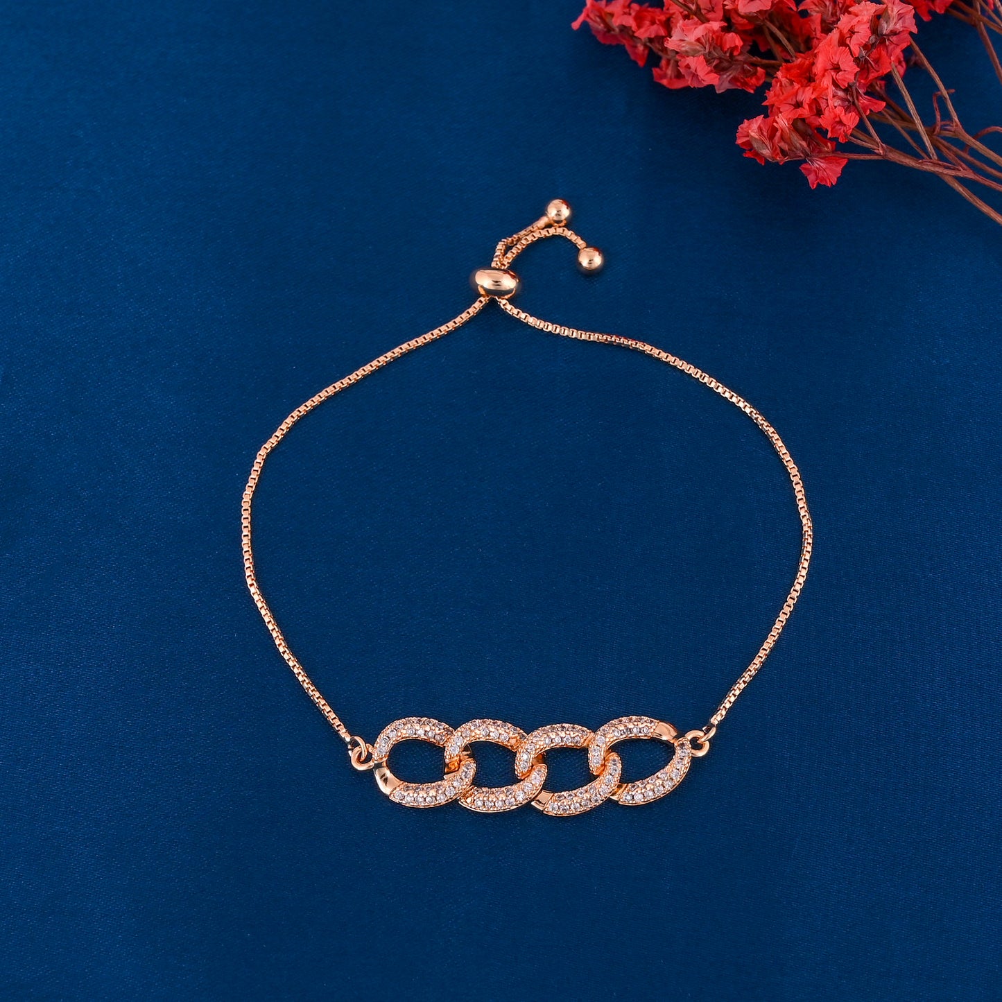 CKLAKART's NOOR Gold-Toned Bracelet Featuring Intricate Loops and American Diamonds