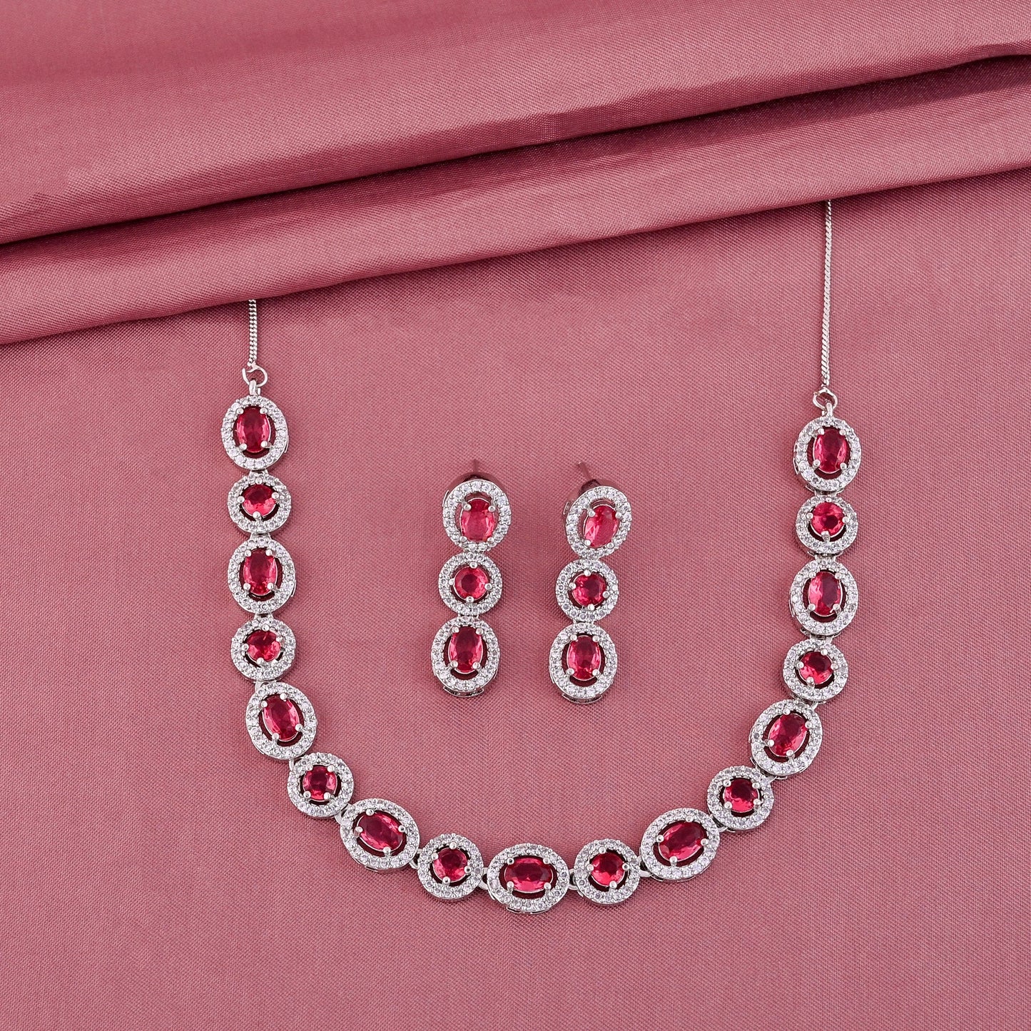 CKLAKART's NOOR Silver Necklace Set Featuring Ruby Color Stones and American Diamonds