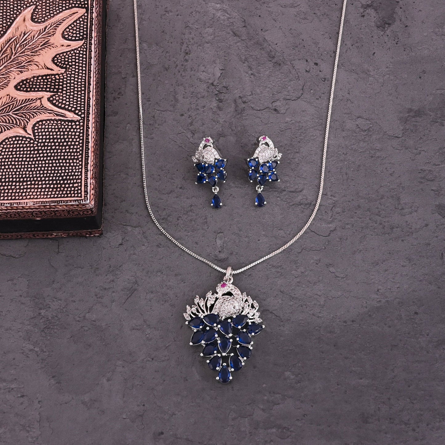 CKLAKART's NOOR Elegant Silver-Toned Peacock Pendant Set with Sapphire Blue Stones and American Diamonds
