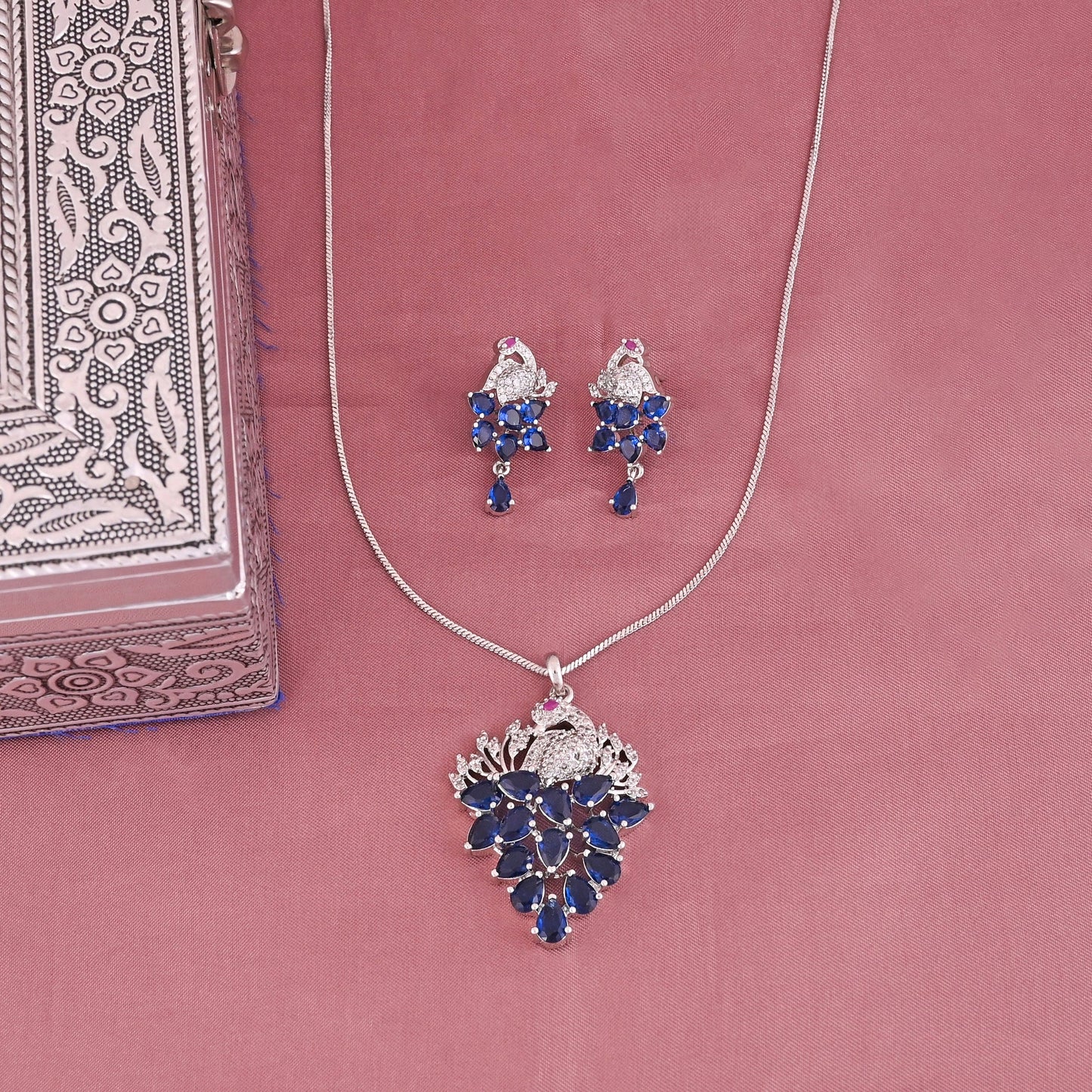 CKLAKART's NOOR Elegant Silver-Toned Peacock Pendant Set with Sapphire Blue Stones and American Diamonds