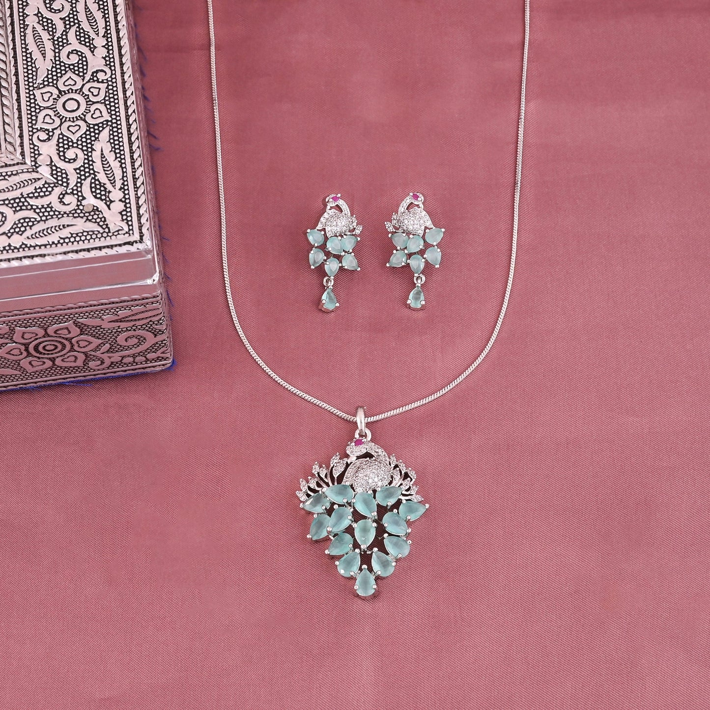 CKLAKART's NOOR Elegant Silver-Toned Peacock Pendant Set with Aquamarine Green Stones and American Diamonds