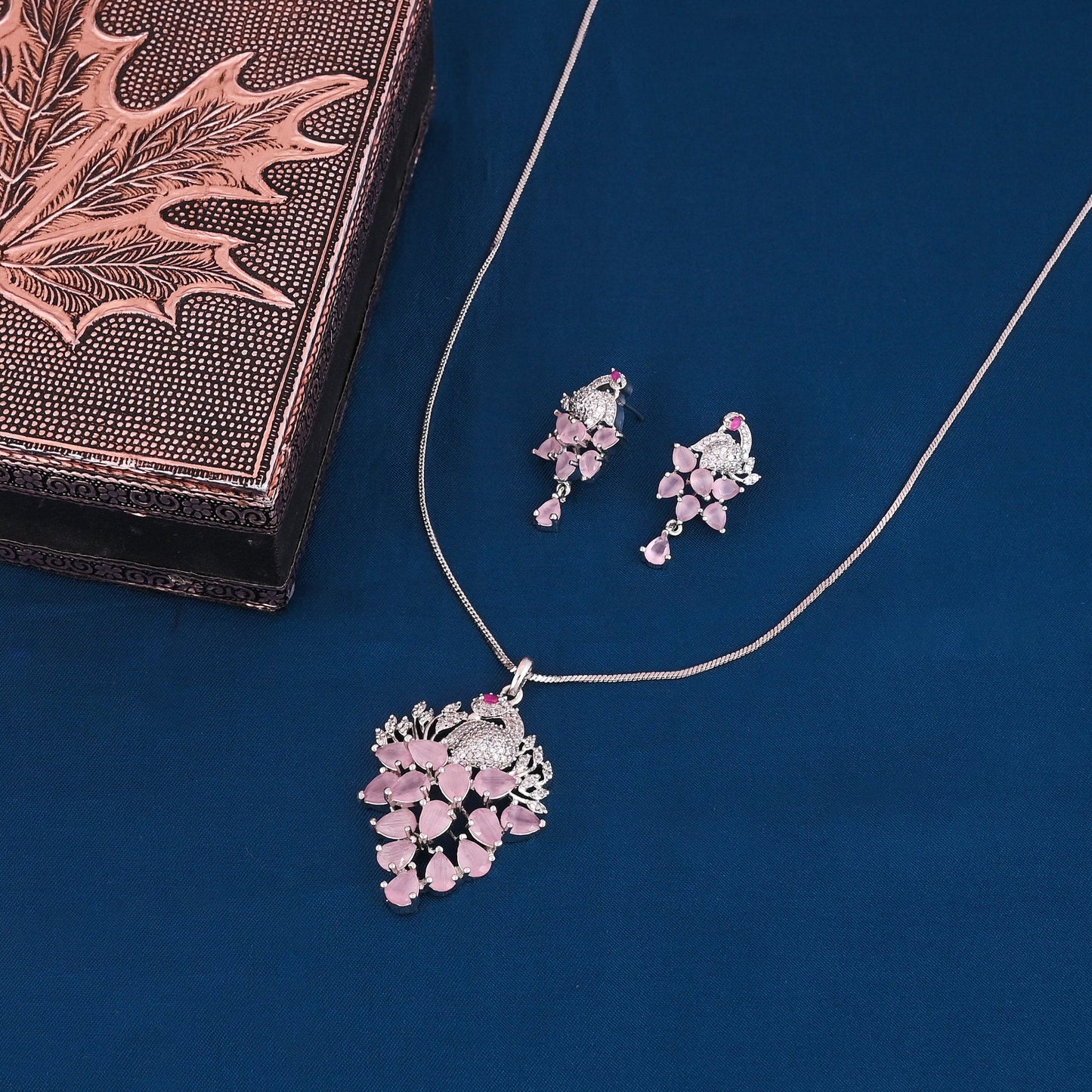 CKLAKART's NOOR Elegant Silver-Toned Peacock Pendant Set with Pink Stones and American Diamonds
