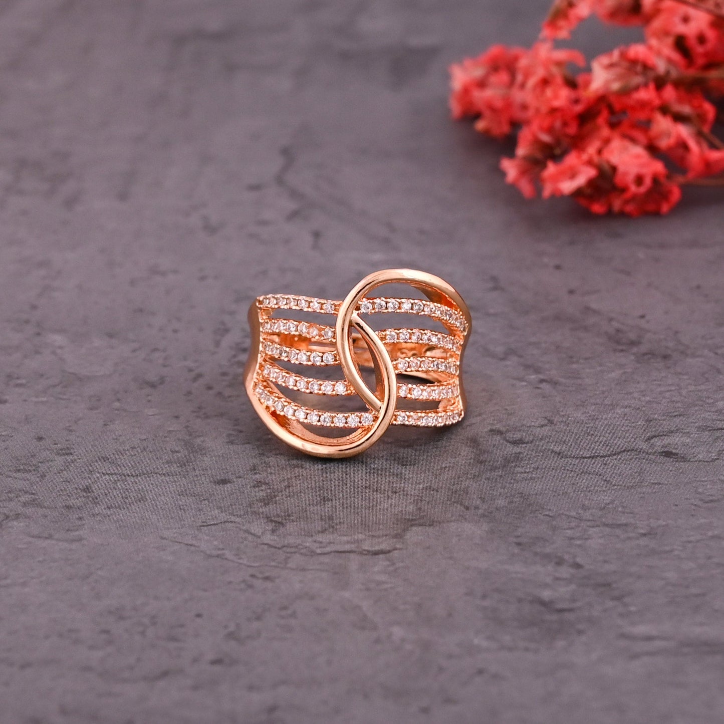 CKLAKART's Rose Gold Tone Wavy Statement Ring with American Diamond