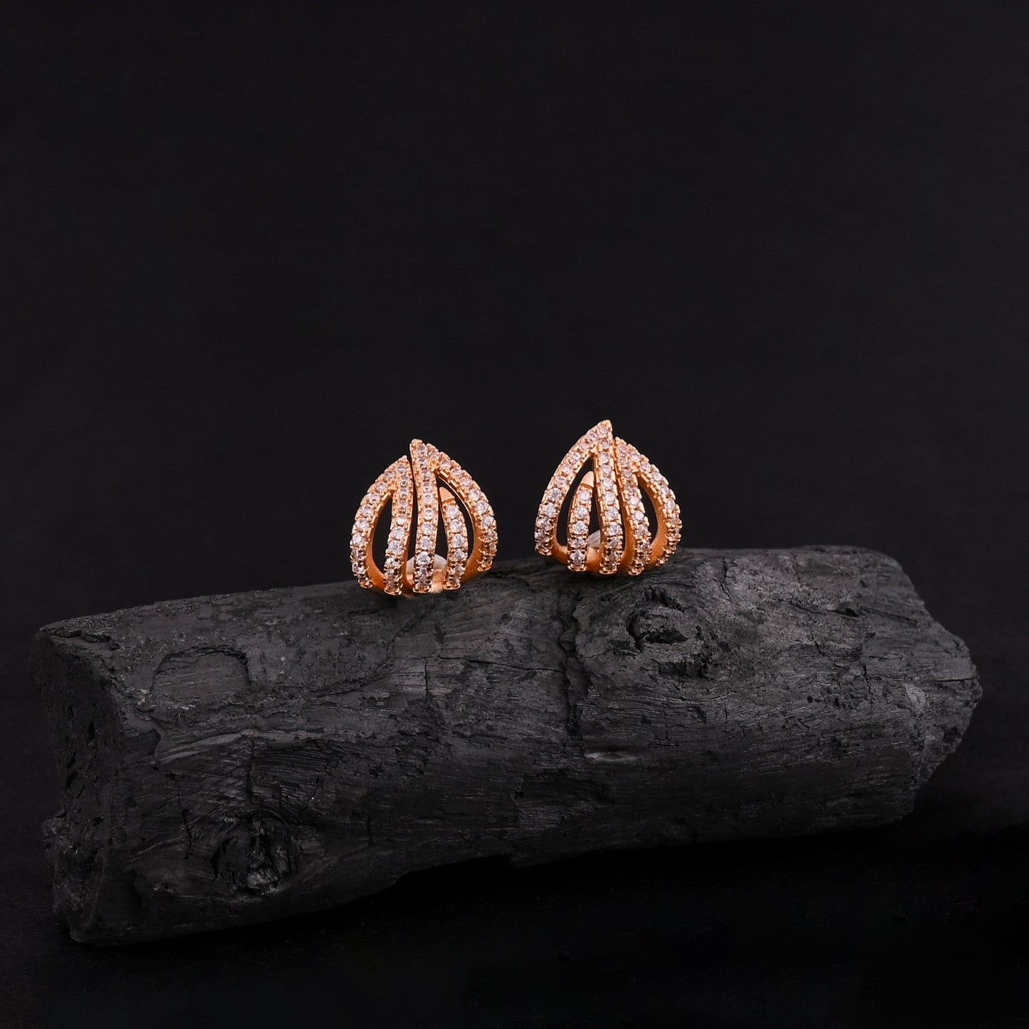 CKLAKART's Gold Toned Wave Stud Earrings with Sparkling American Diamonds