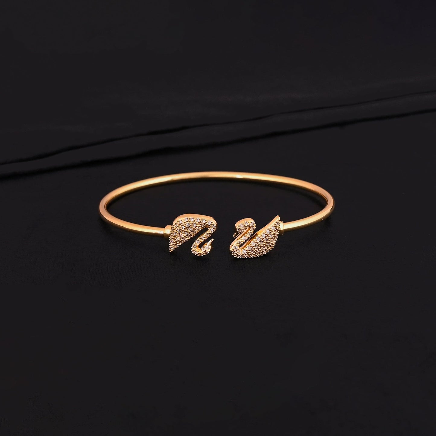 CKLAKART's Gold Toned Bracelet with Beautiful Swan Adorned with American Diamonds