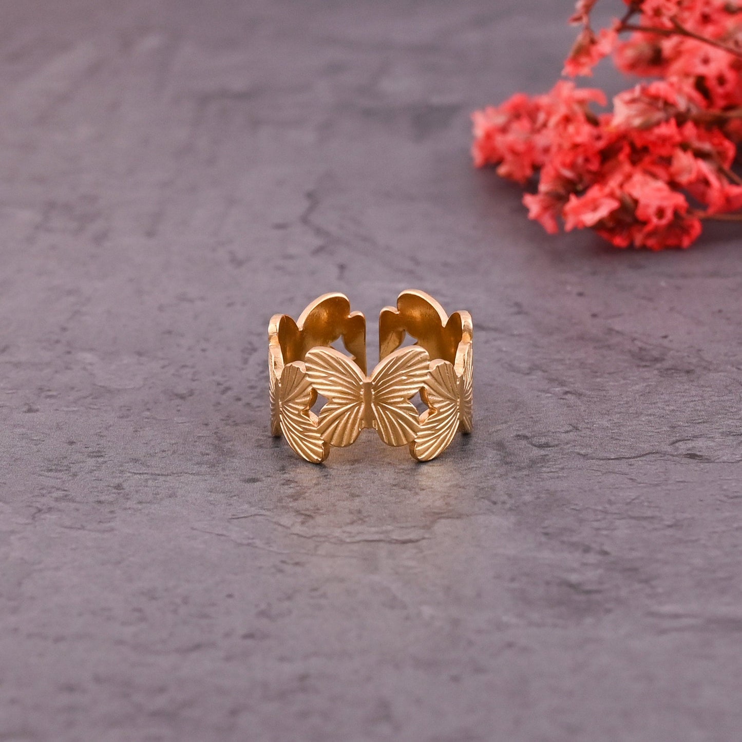 CKLAKART's Gold Toned Statement Ring Embellished with Butterflies