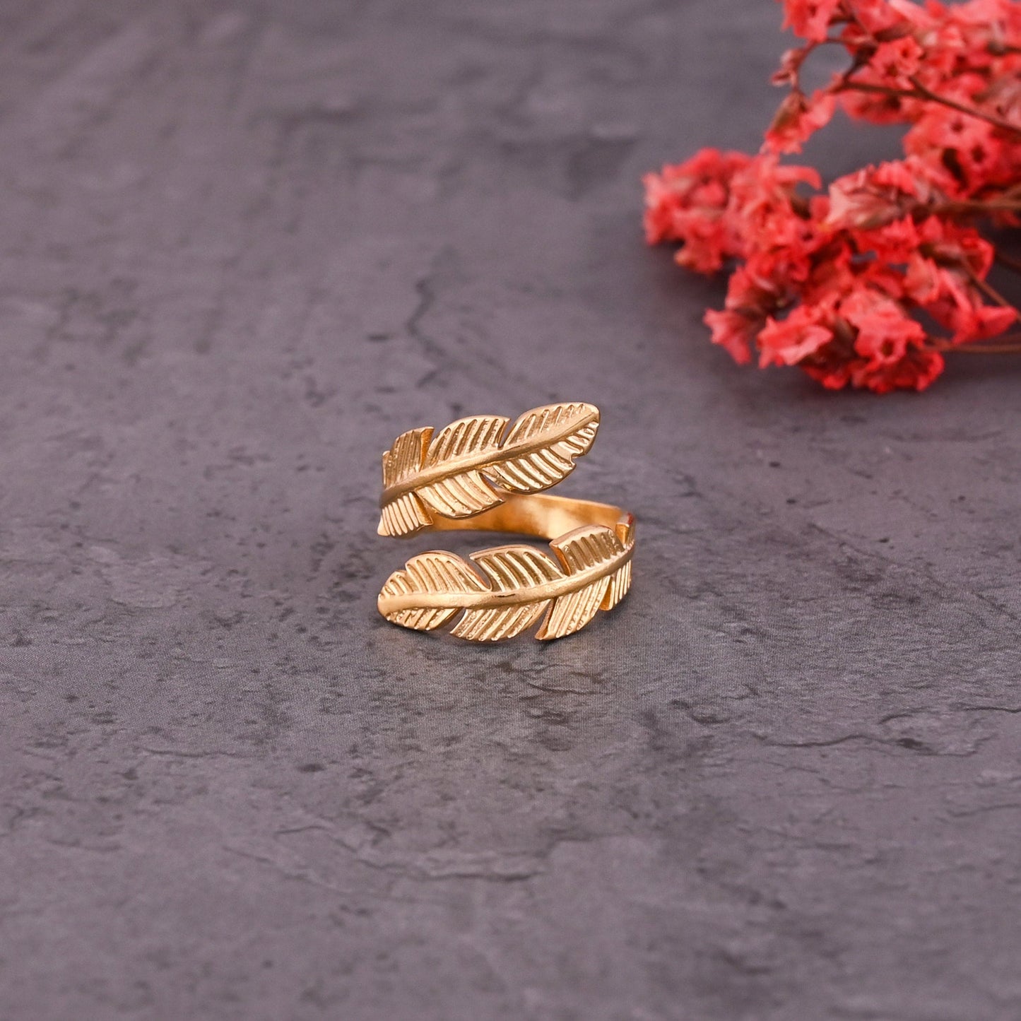 CKLAKART's Gold Toned Statement Ring Featuring Leaf Pattern